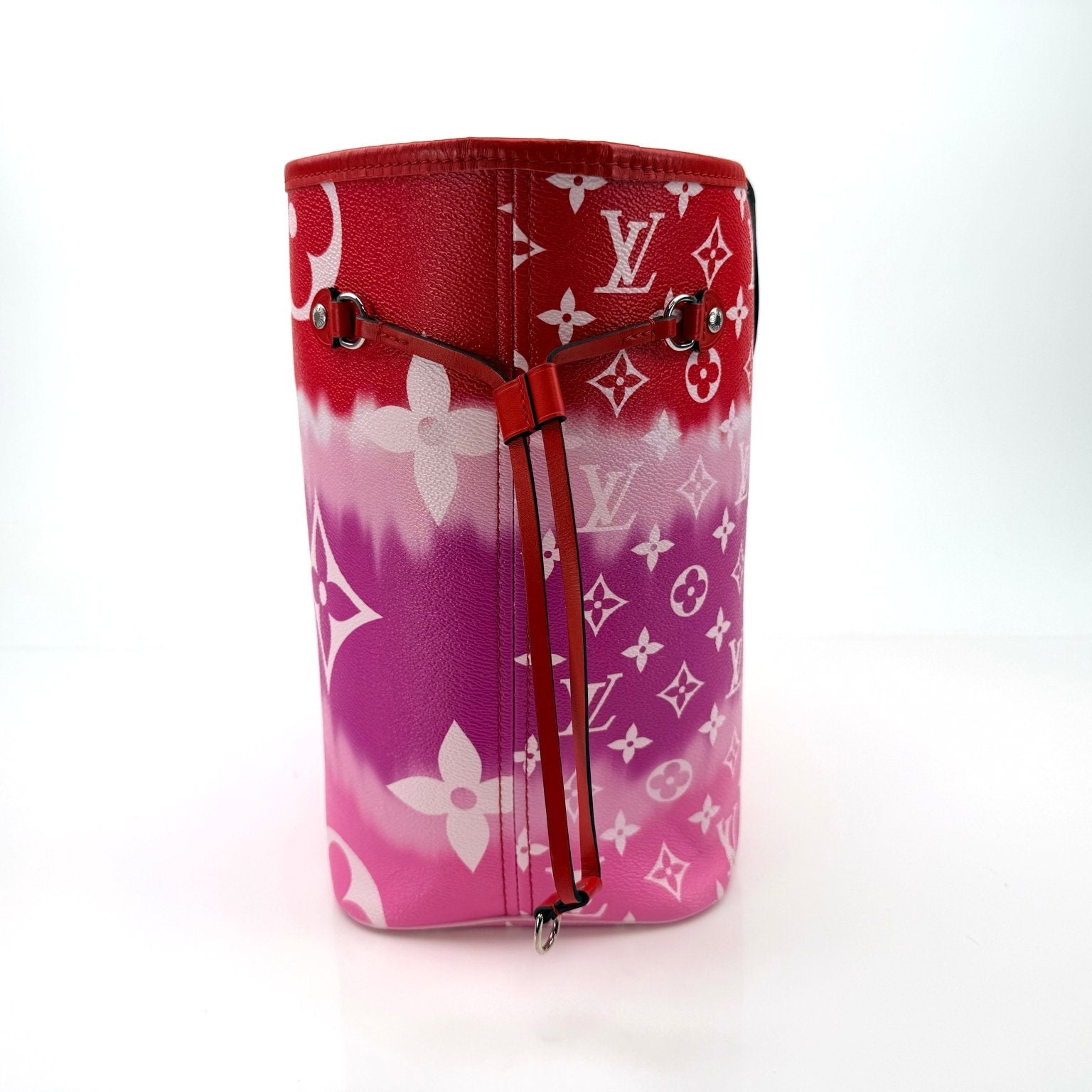 Louis Vuitton Neverfull Escale tote handbag with gold accents, featuring the iconic print and spacious interior.