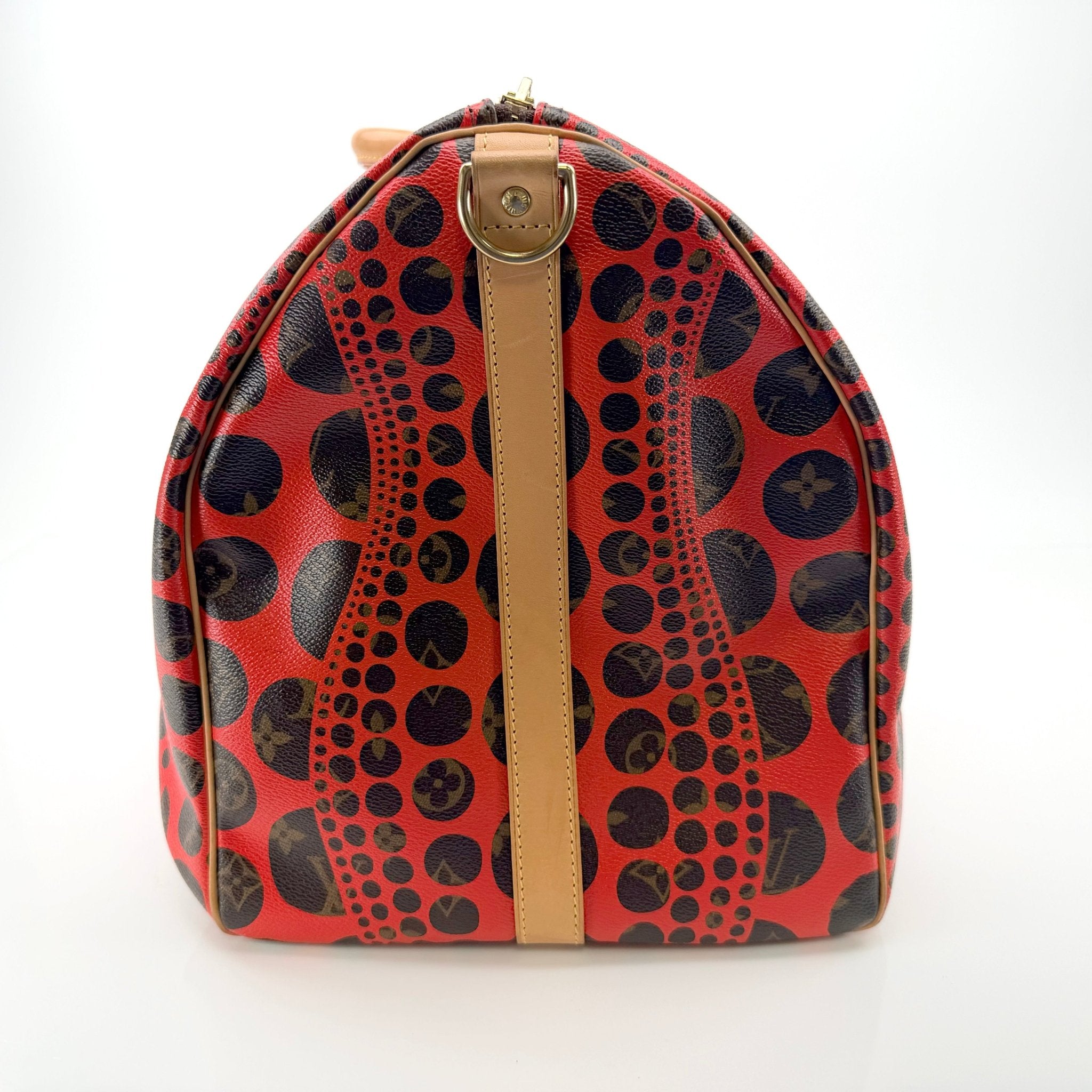 Louis Vuitton x Yayoi Kusama polka dot travel bag by Gold & Beyond, featuring signature polka dot pattern and spacious design.