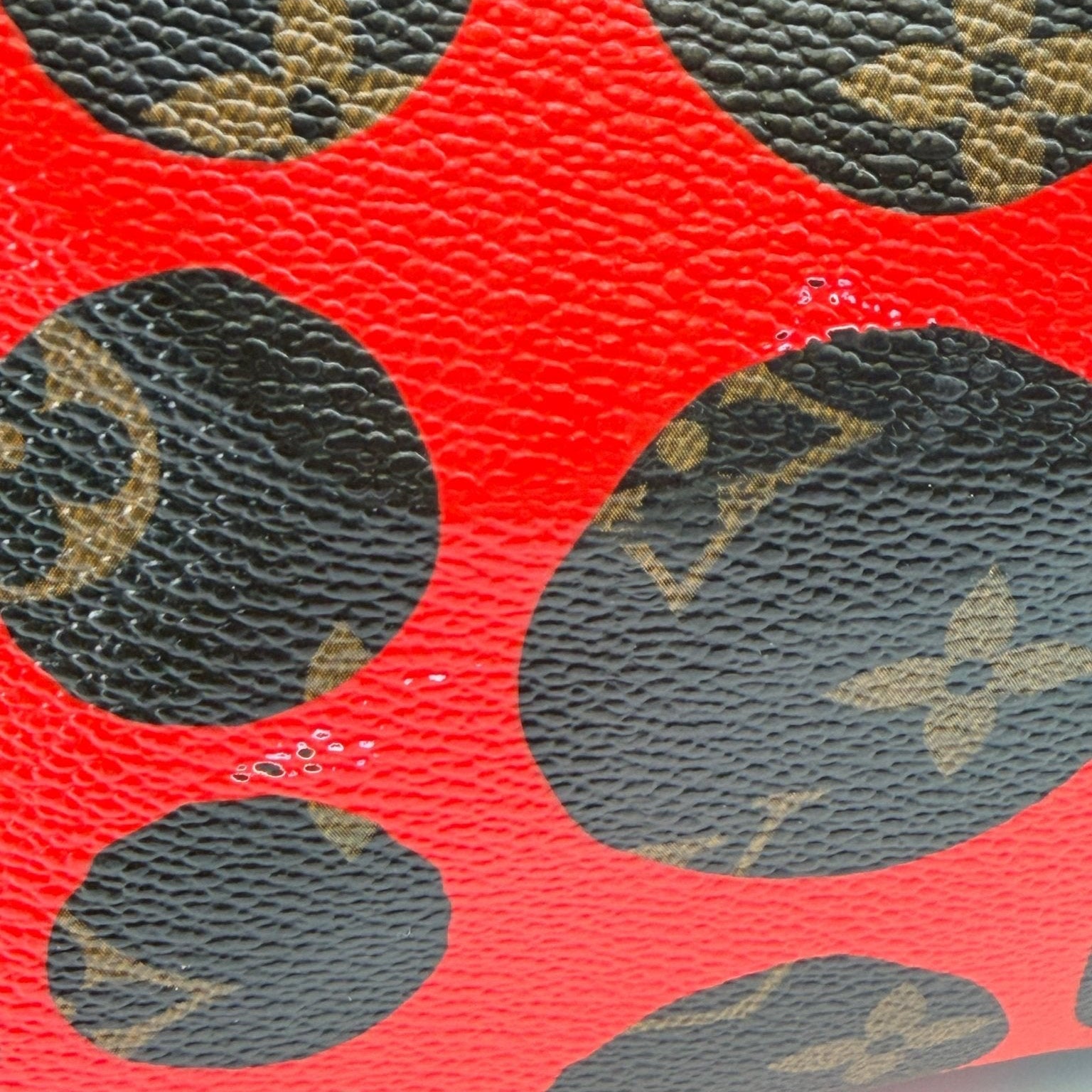 Louis Vuitton x Yayoi Kusama polka dot travel bag by Gold & Beyond, featuring vibrant designer patterns and spacious storage.