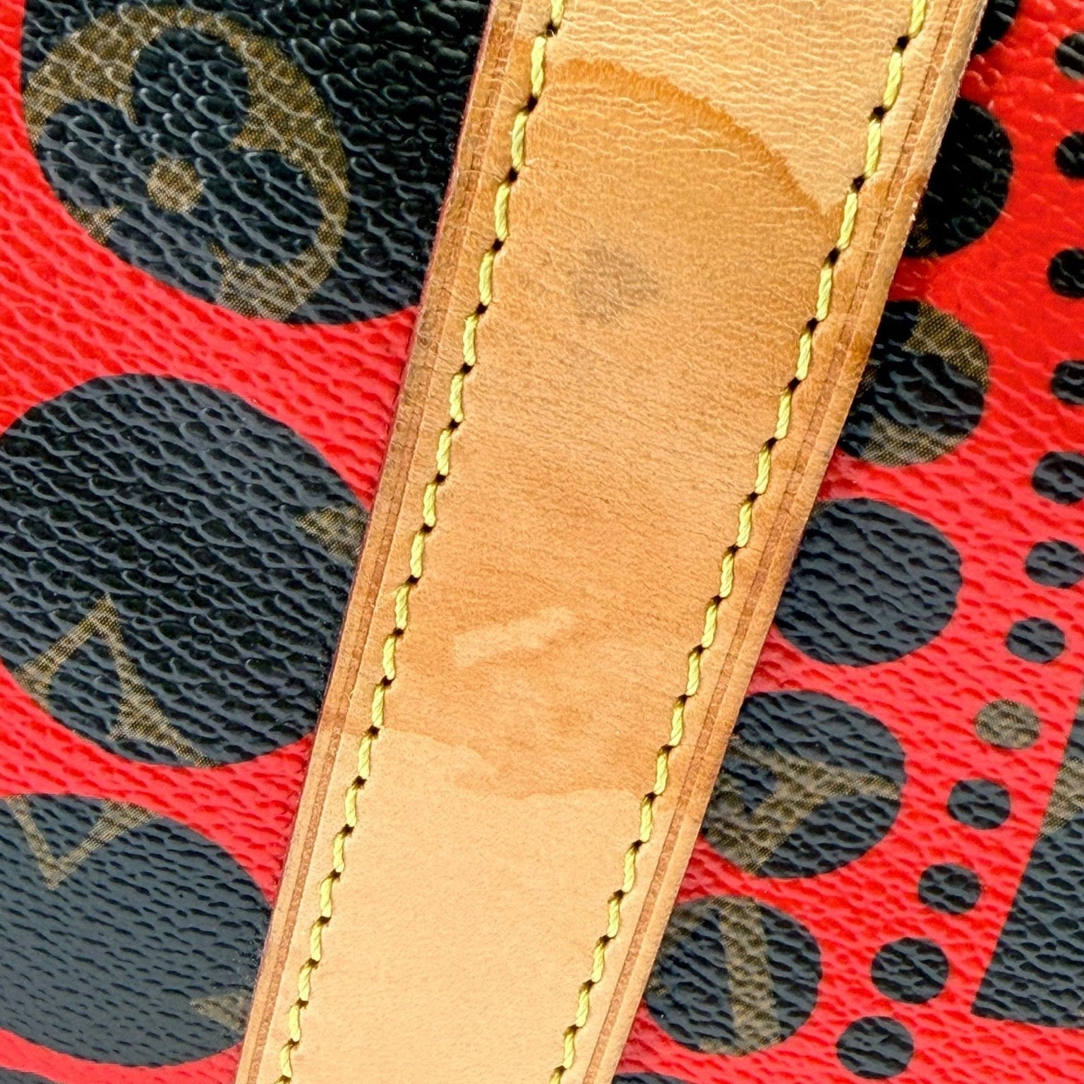 Louis Vuitton x Yayoi Kusama polka dot travel bag by Gold & Beyond, featuring iconic design and spacious interior.