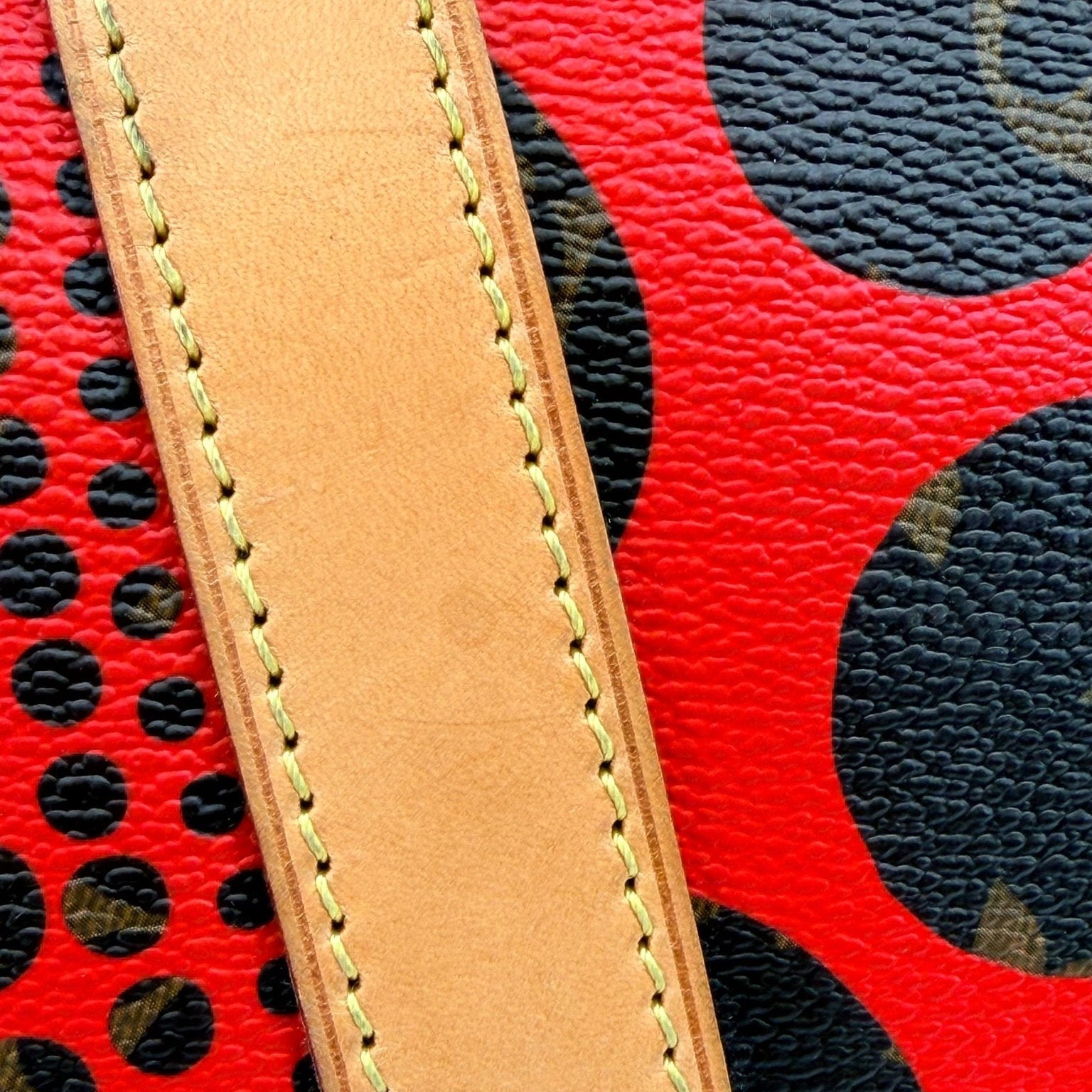 Louis Vuitton x Yayoi Kusama polka dot travel bag by Gold & Beyond, featuring vibrant polka dot design and spacious travel storage