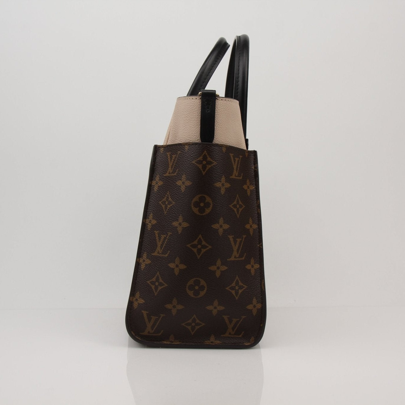 Louis Vuitton On My Side MM handbag by Gold & Beyond, featuring a stylish design with leather accents and gold hardware.