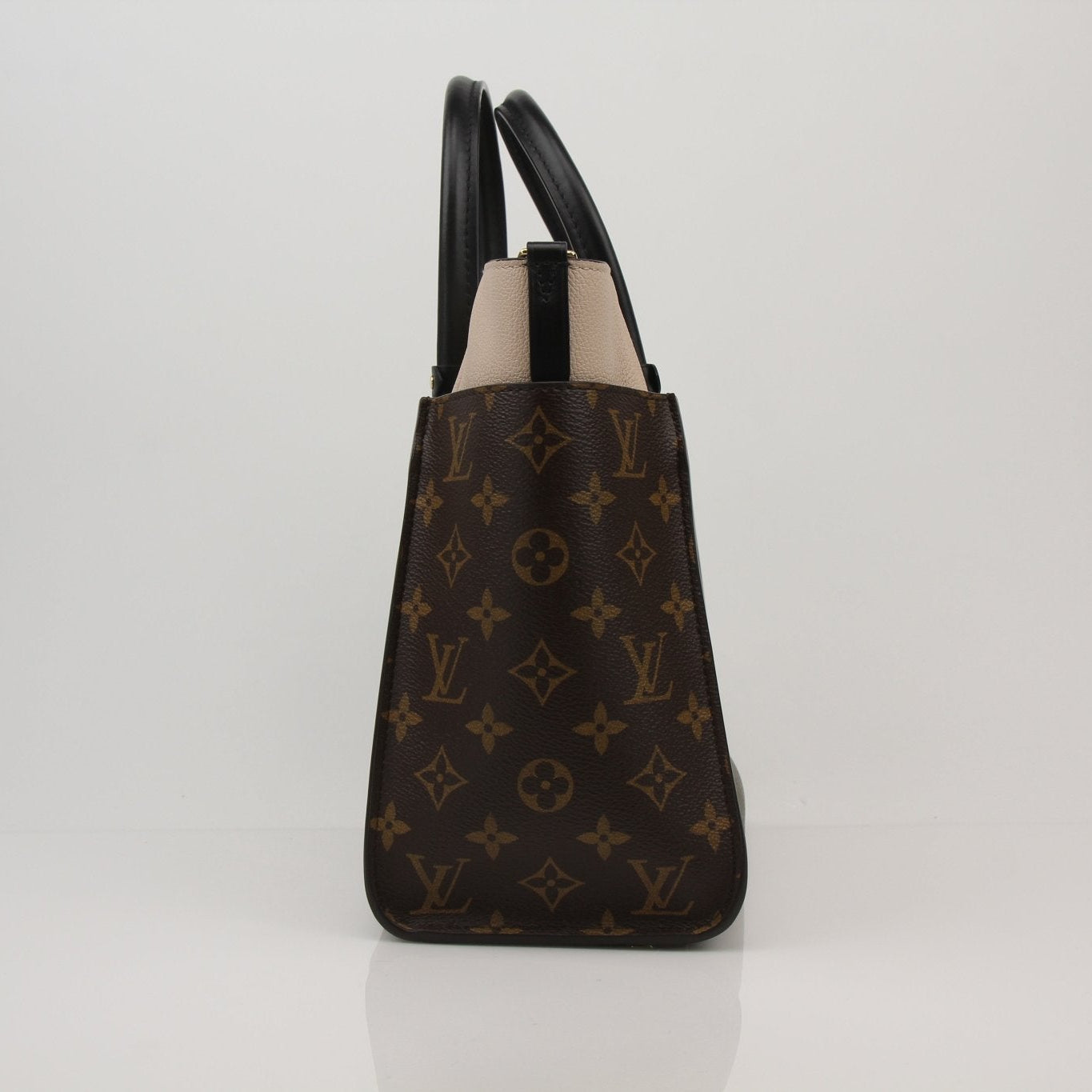 Louis Vuitton On My Side MM handbag in black leather with gold hardware, featuring the iconic LV monogram and structured design.