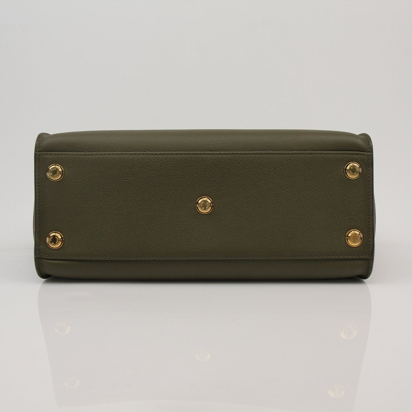 Louis Vuitton On My Side MM handbag in beige canvas with leather trim, featuring gold hardware and top handles.