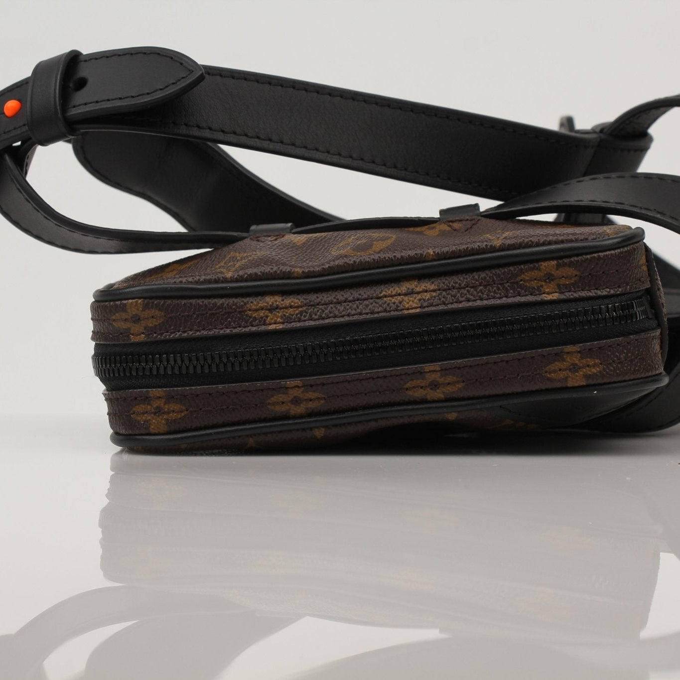 Louis Vuitton Utility Crossbody handbag by Gold & Beyond, featuring durable canvas and adjustable strap, stylish everyday accessory.