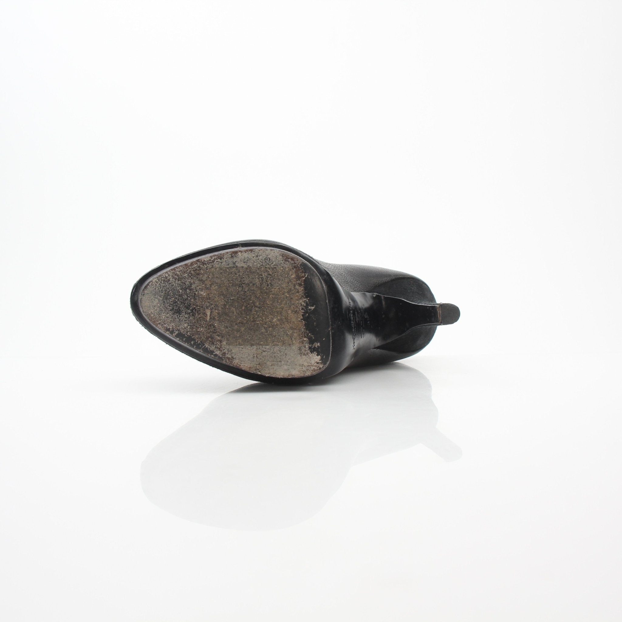 Black leather Saint Laurent Rive Gauche ankle platform pumps with chunky heels, showcased on a neutral background.