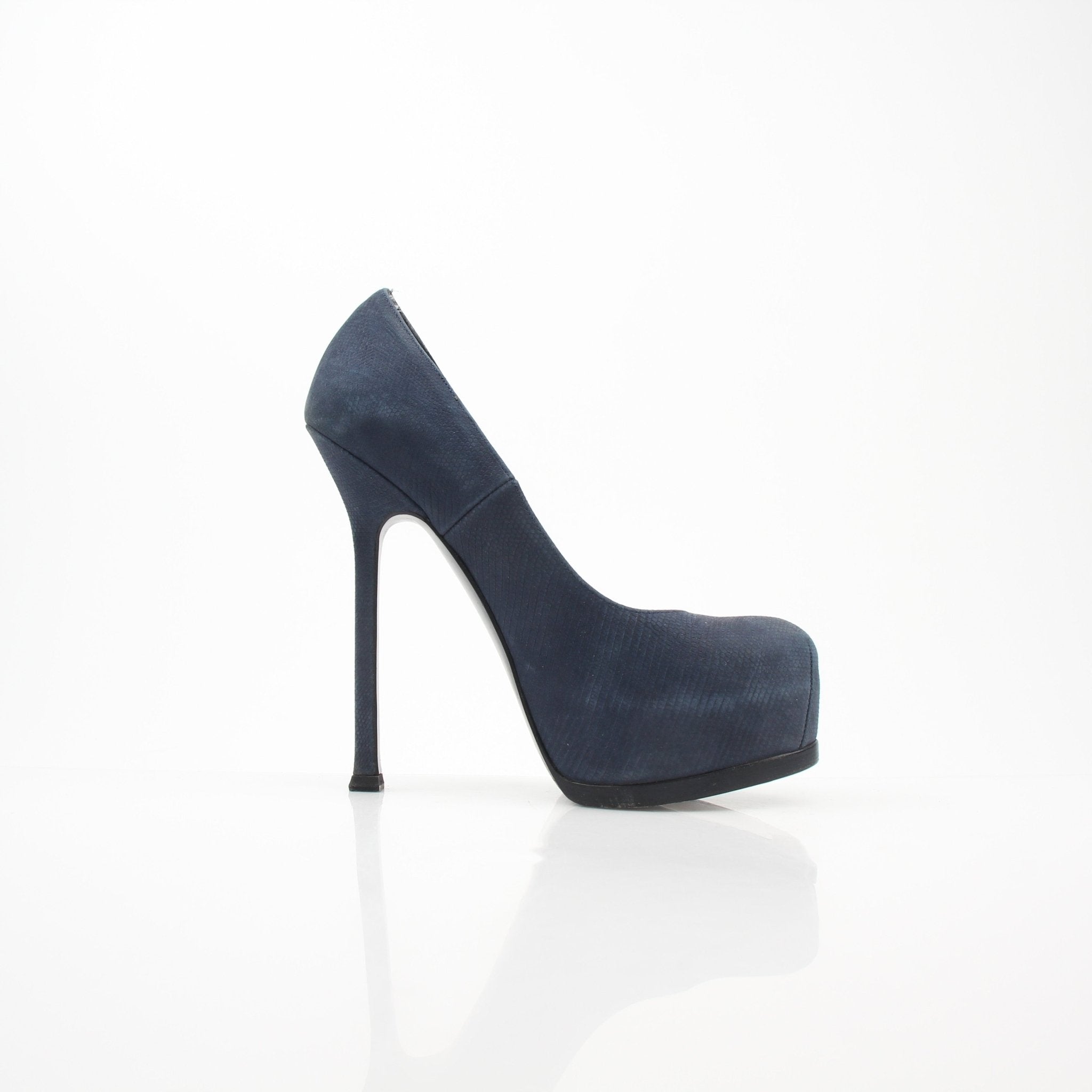 Navy suede Saint Laurent Tribute Two platform heel pumps with chunky heel and pointed toe, displayed on a neutral background.
