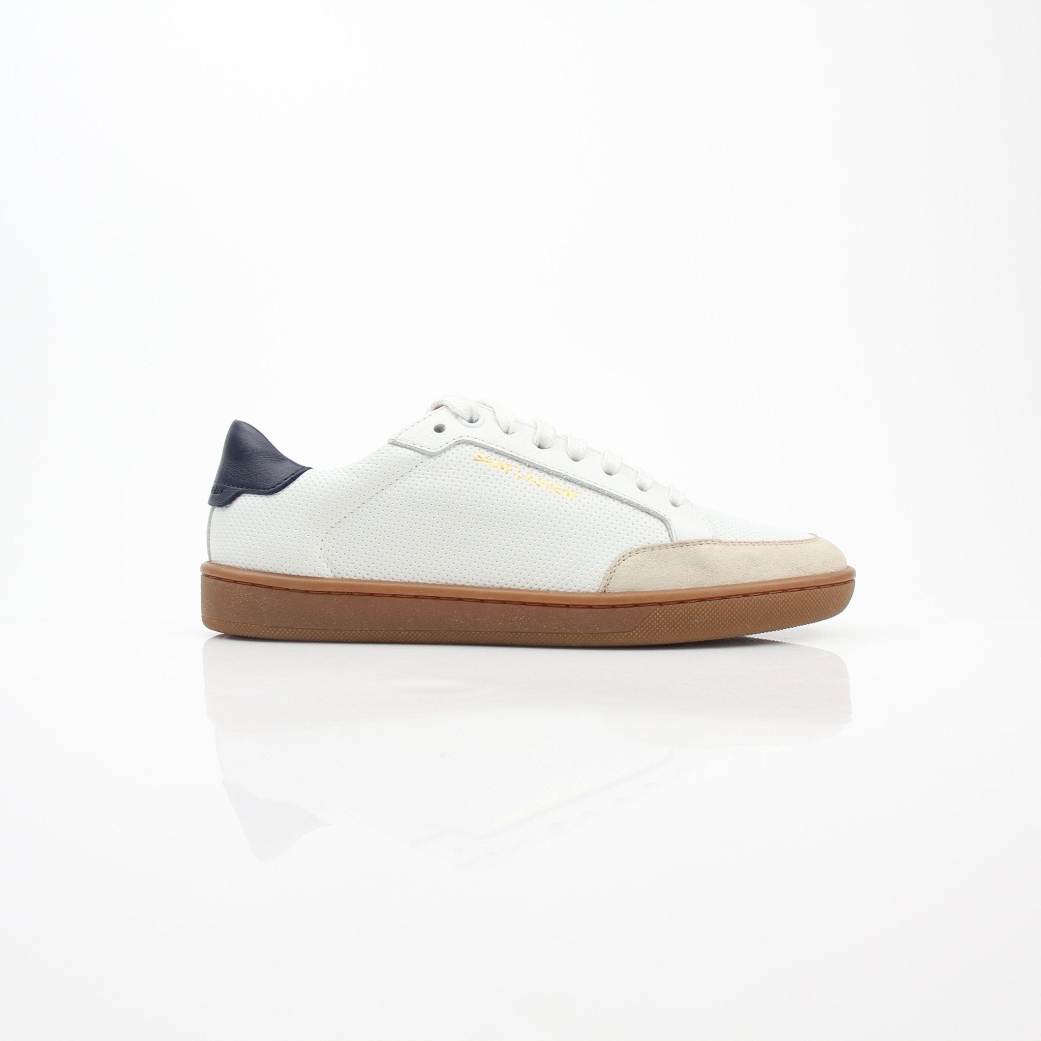 White leather Saint Laurent Court Classic SL/10 sneakers, low-top shoes with sleek design and gold accents, by Gold & Beyond.