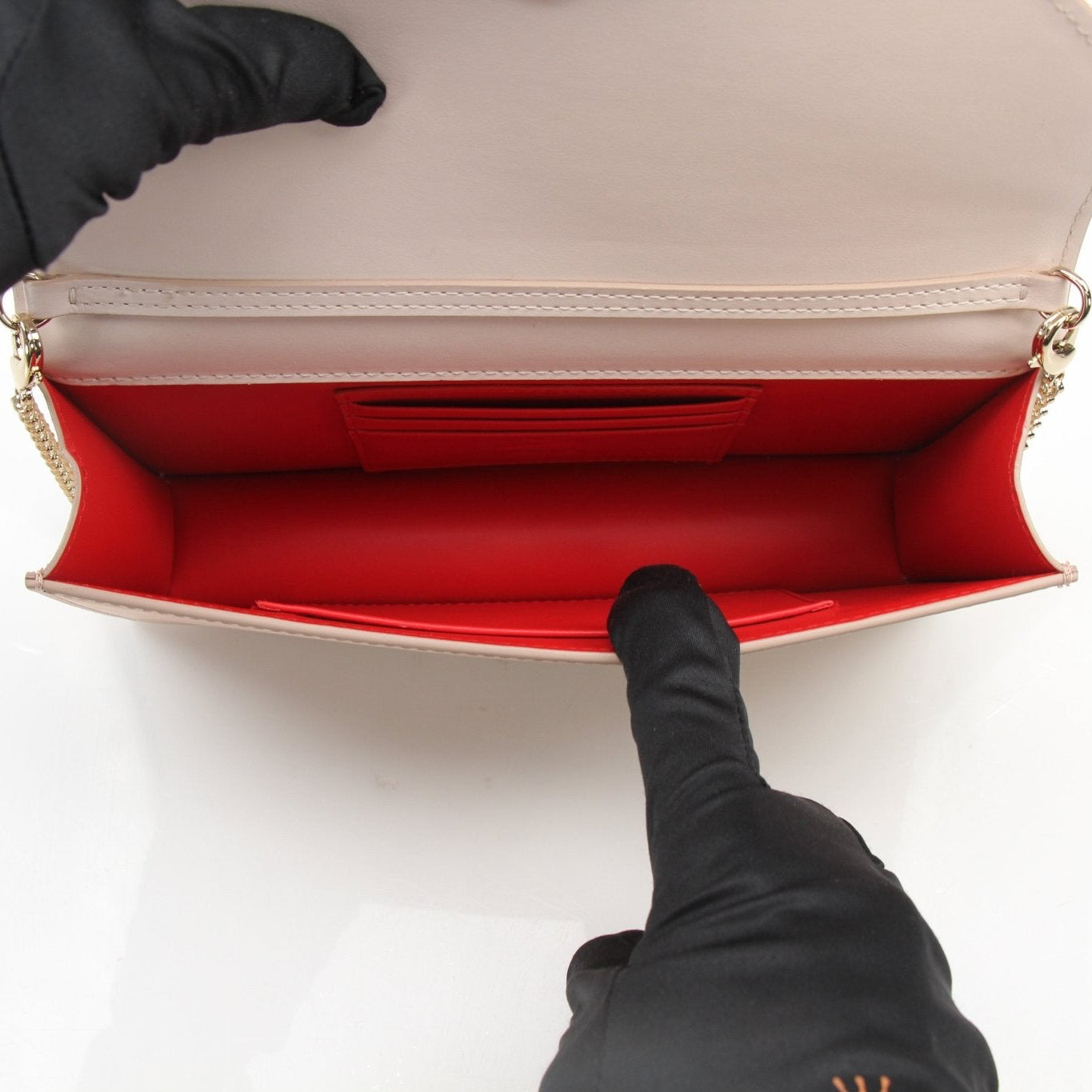 Christian Louboutin Loubi54 satin clutch handbag with gold accents, featuring a sleek, elegant design and signature style.