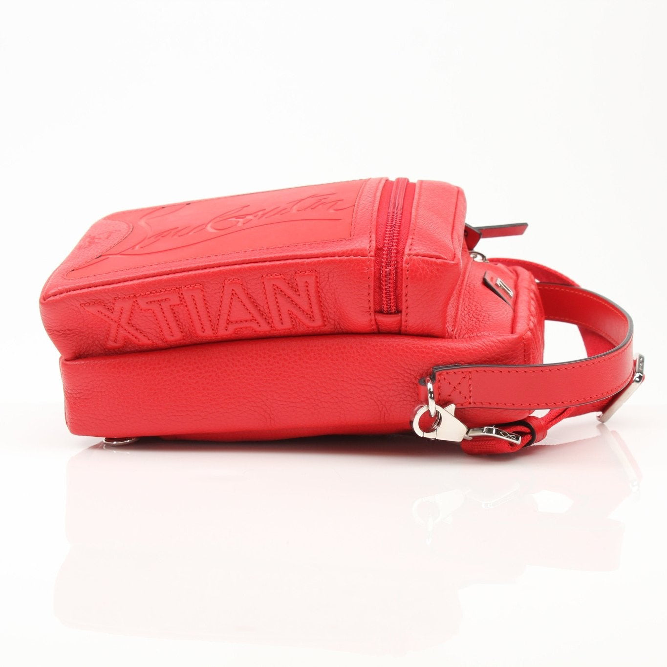 Christian Louboutin Loubideal crossbody handbag with gold accents and signature design, featuring a sleek, stylish look.