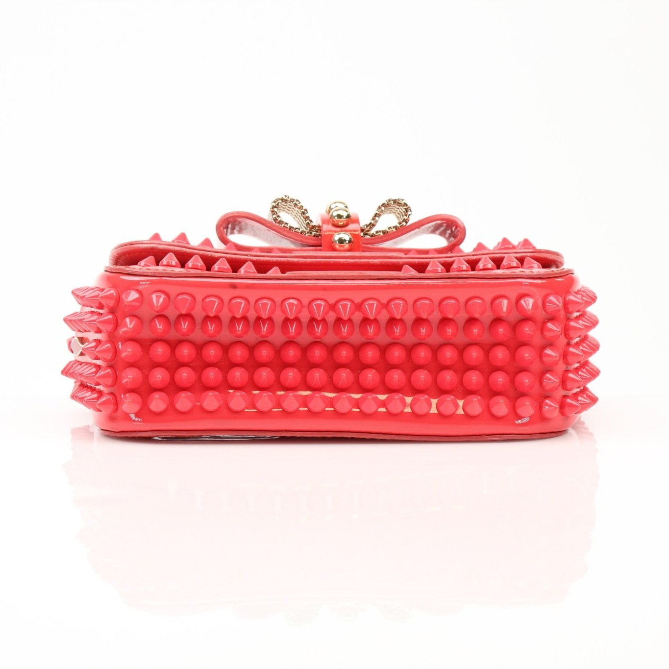 Gold & Beyond Christian Louboutin Spiked Sweet Charity mini handbag with black leather and gold-tone hardware, featuring signature spikes.