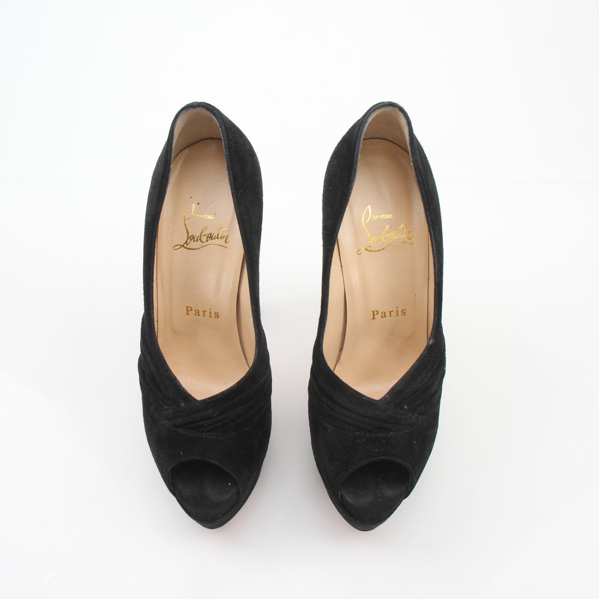 Christian Louboutin Drapadita black suede platform heels with stiletto heels and signature red soles.