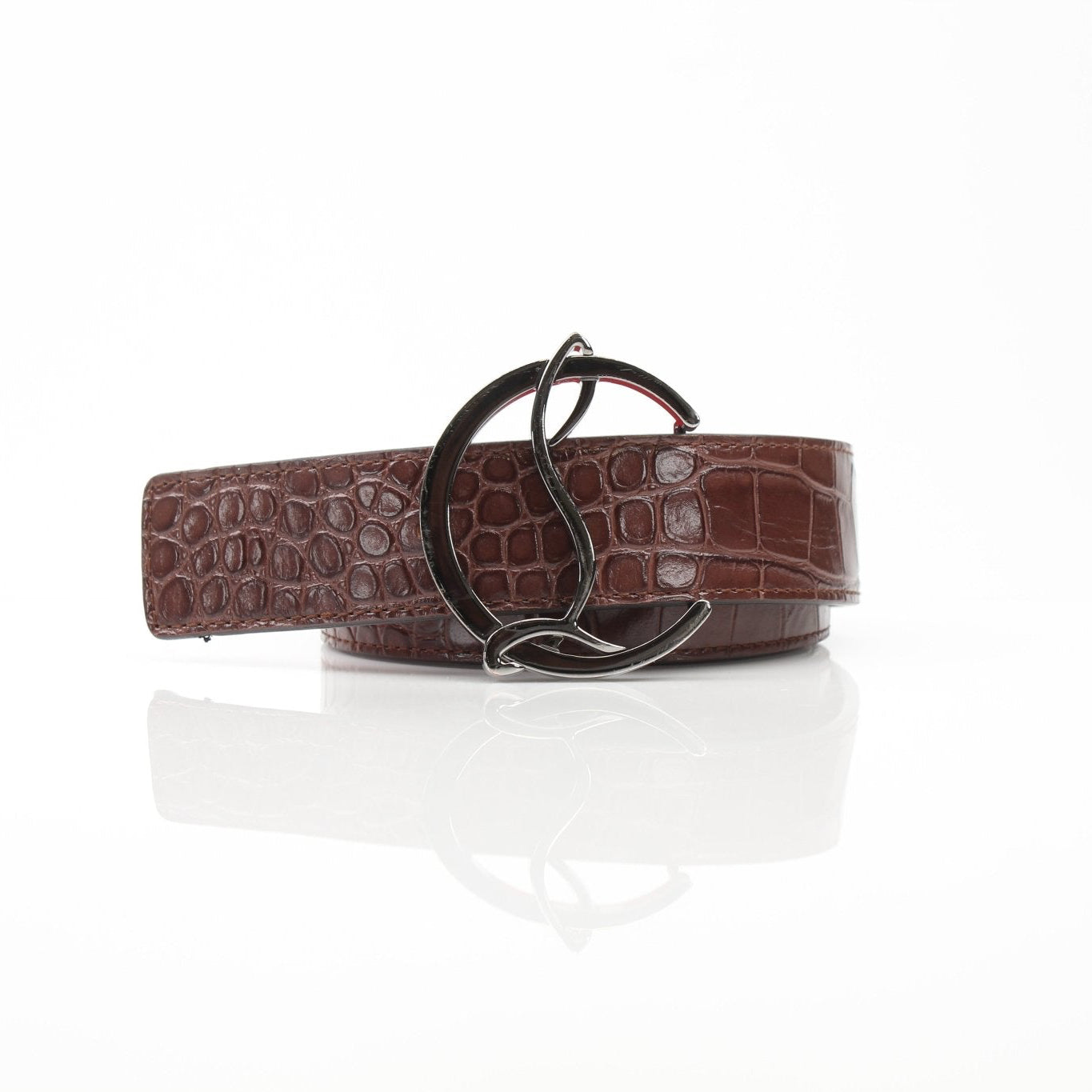 Gold & Beyond Christian Louboutin croc-embossed leather belt with gold buckle, showcasing luxurious texture and elegant design.