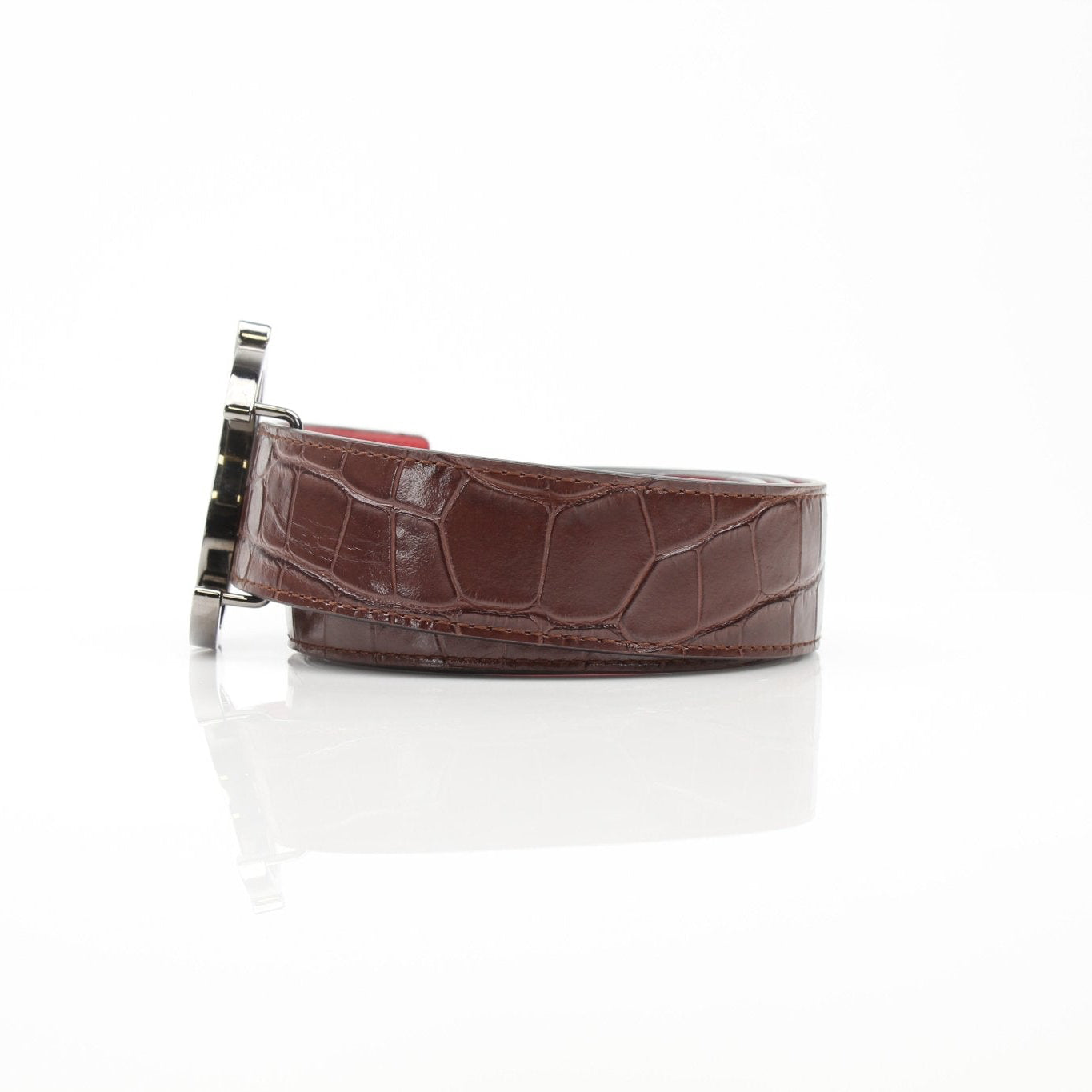 Croc-embossed leather Christian Louboutin belt with gold hardware, showcasing luxury accessories from Gold & Beyond.