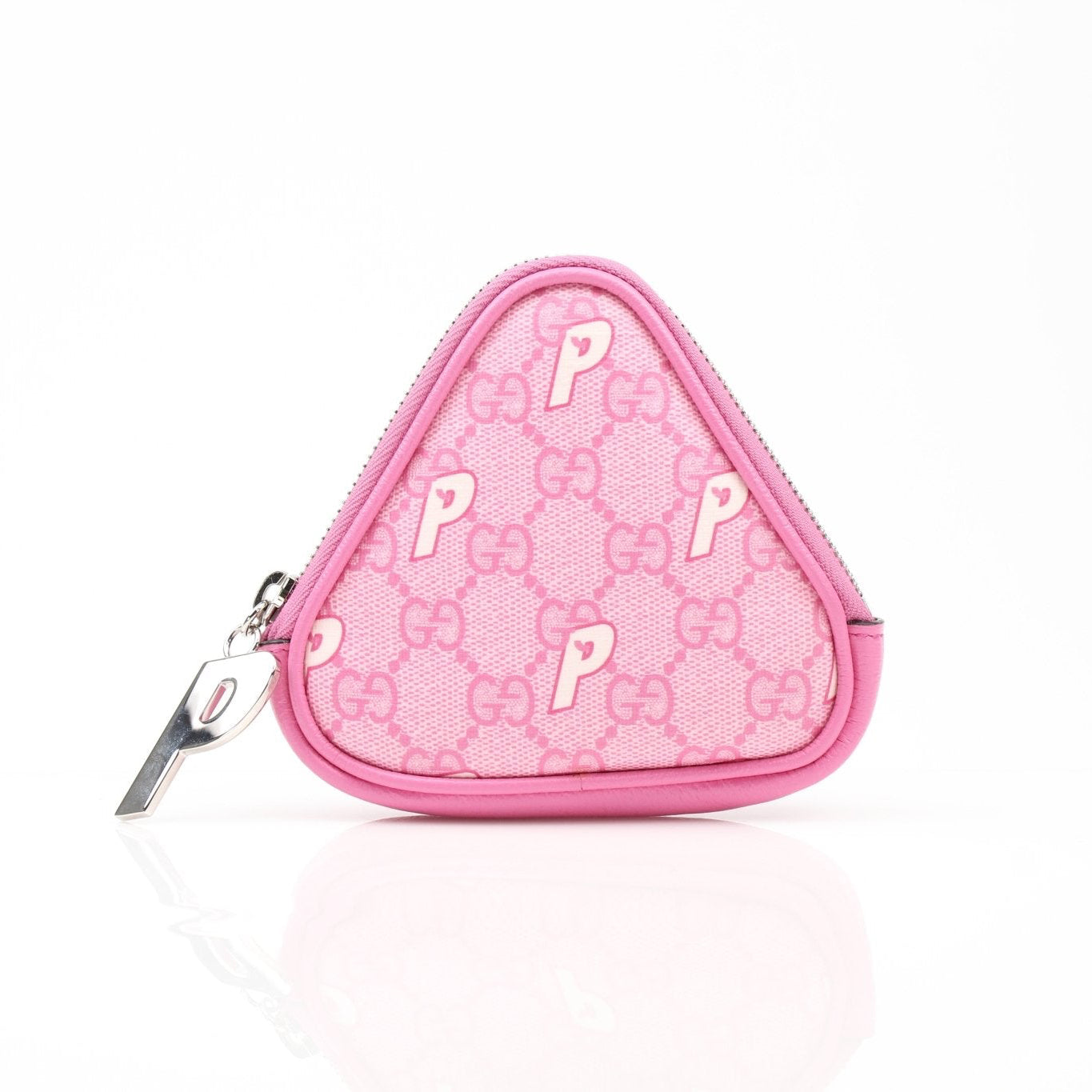Gucci x Palace triangle pouch wallet featuring gold accents and signature design, displayed on a plain background.