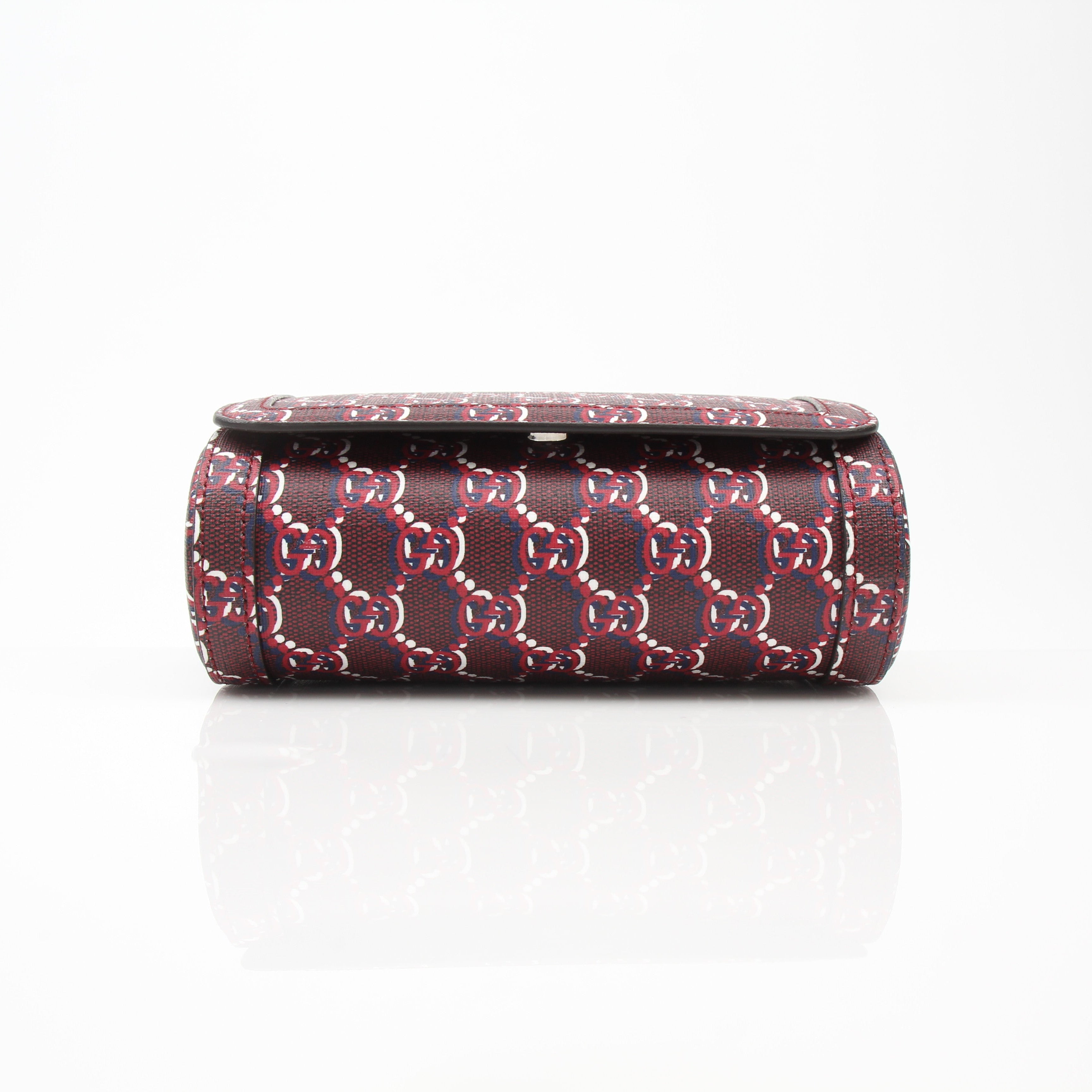 Gucci Shadow GG Micro Crossbody Bag, a stylish black handbag with gold accents, featuring the signature Gucci logo and compact design.