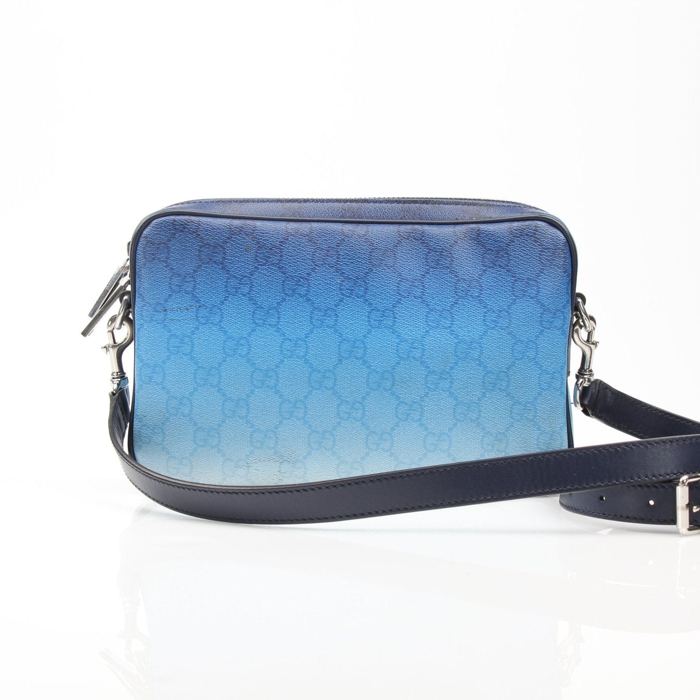 Gold & Beyond Gucci blue gradient GG crossbody handbag with adjustable strap and luxury designer details.