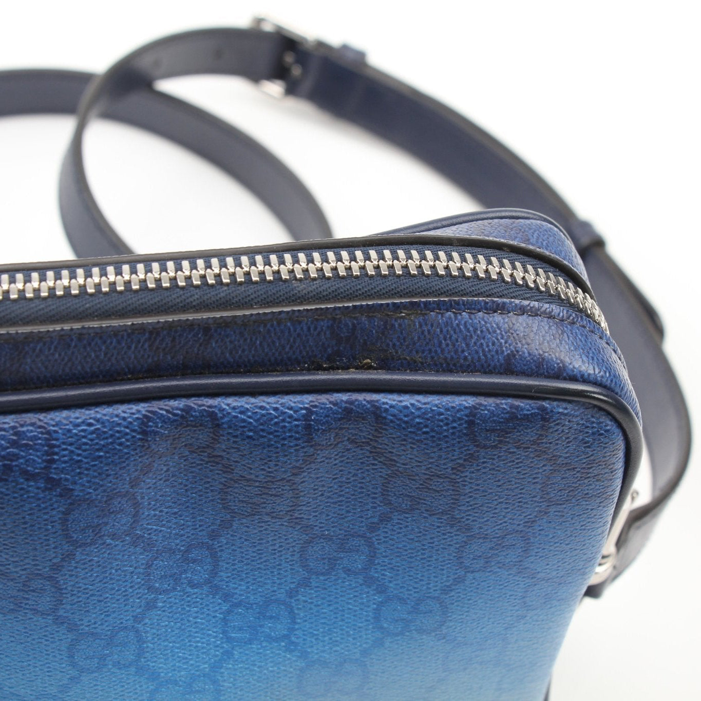 Gucci blue gradient GG crossbody handbag with adjustable strap and gold-tone hardware, stylish and compact for everyday use.