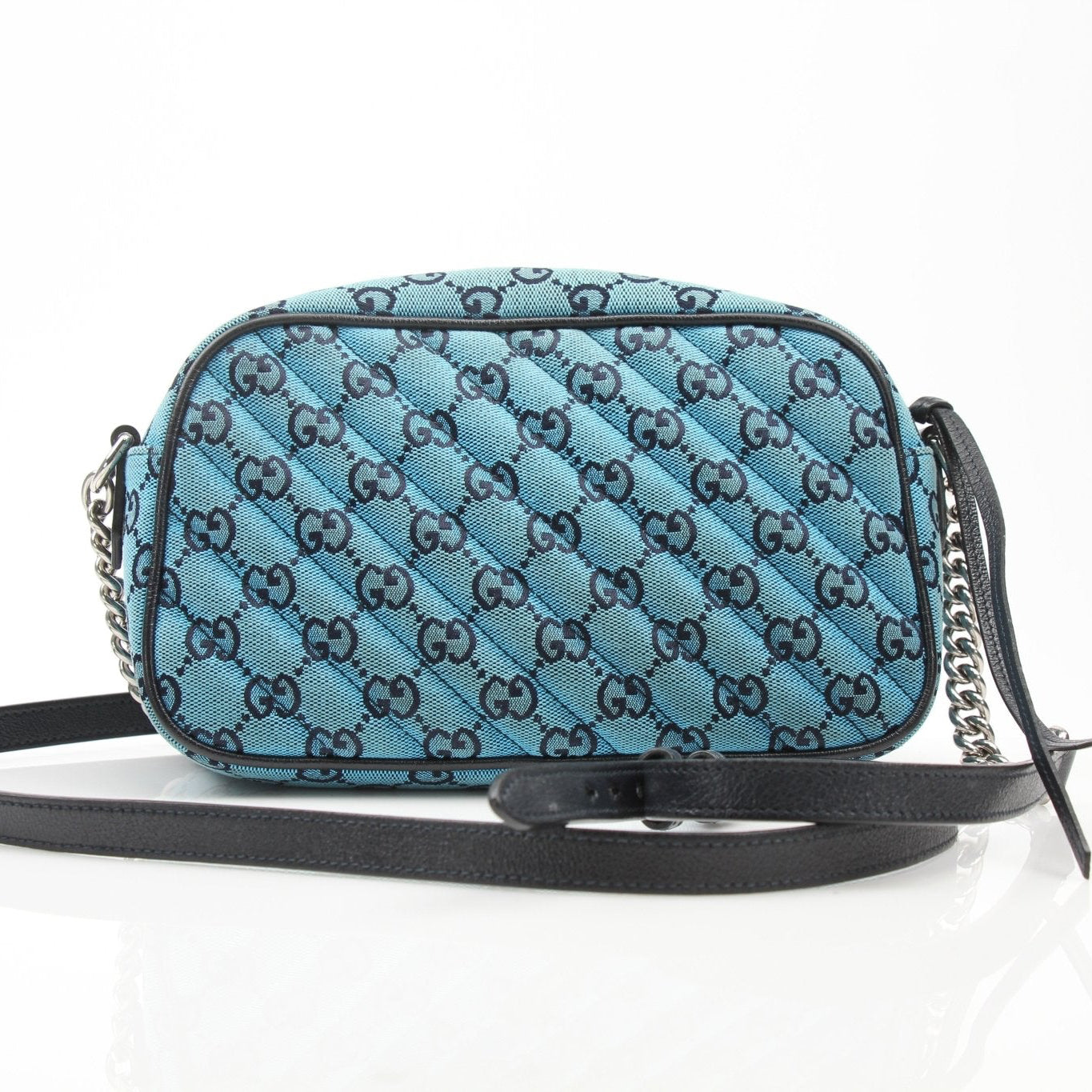 Gold & Beyond Gucci GG Marmont camera bag handbag with quilted leather and gold-tone chain strap, stylish and compact accessory.