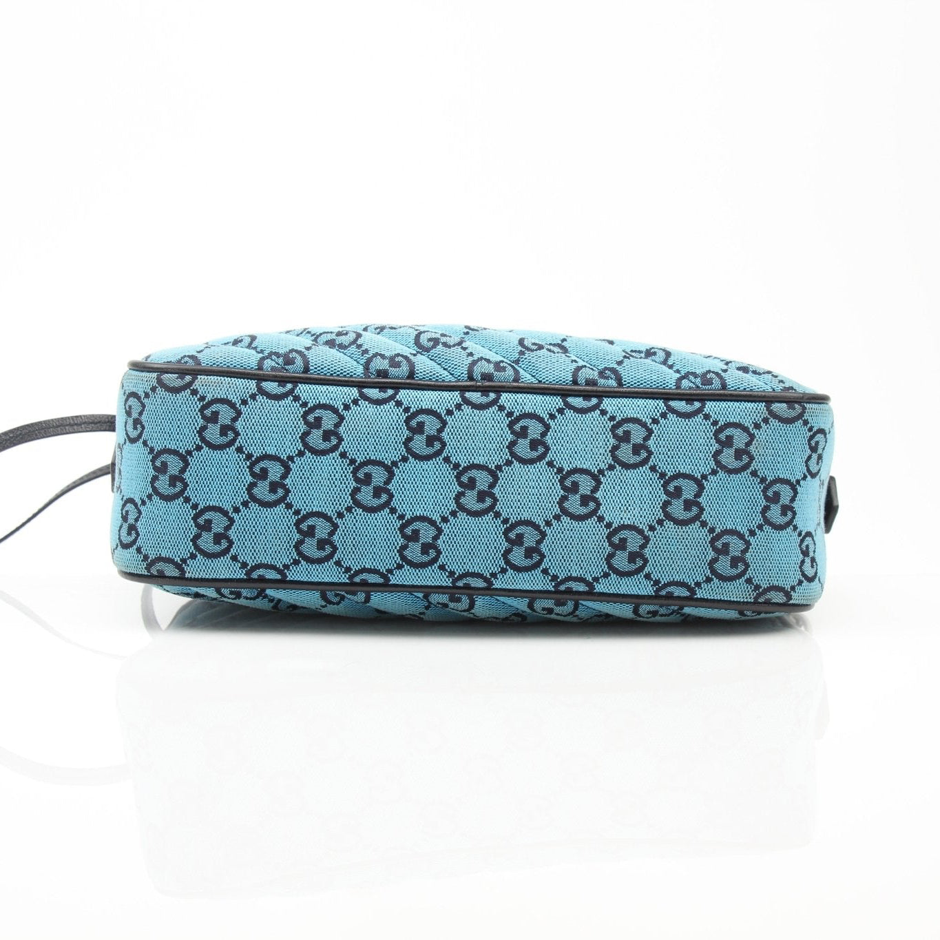 Gold & Beyond Gucci GG Marmont camera handbag with quilted leather and gold hardware, stylish and compact for everyday use.