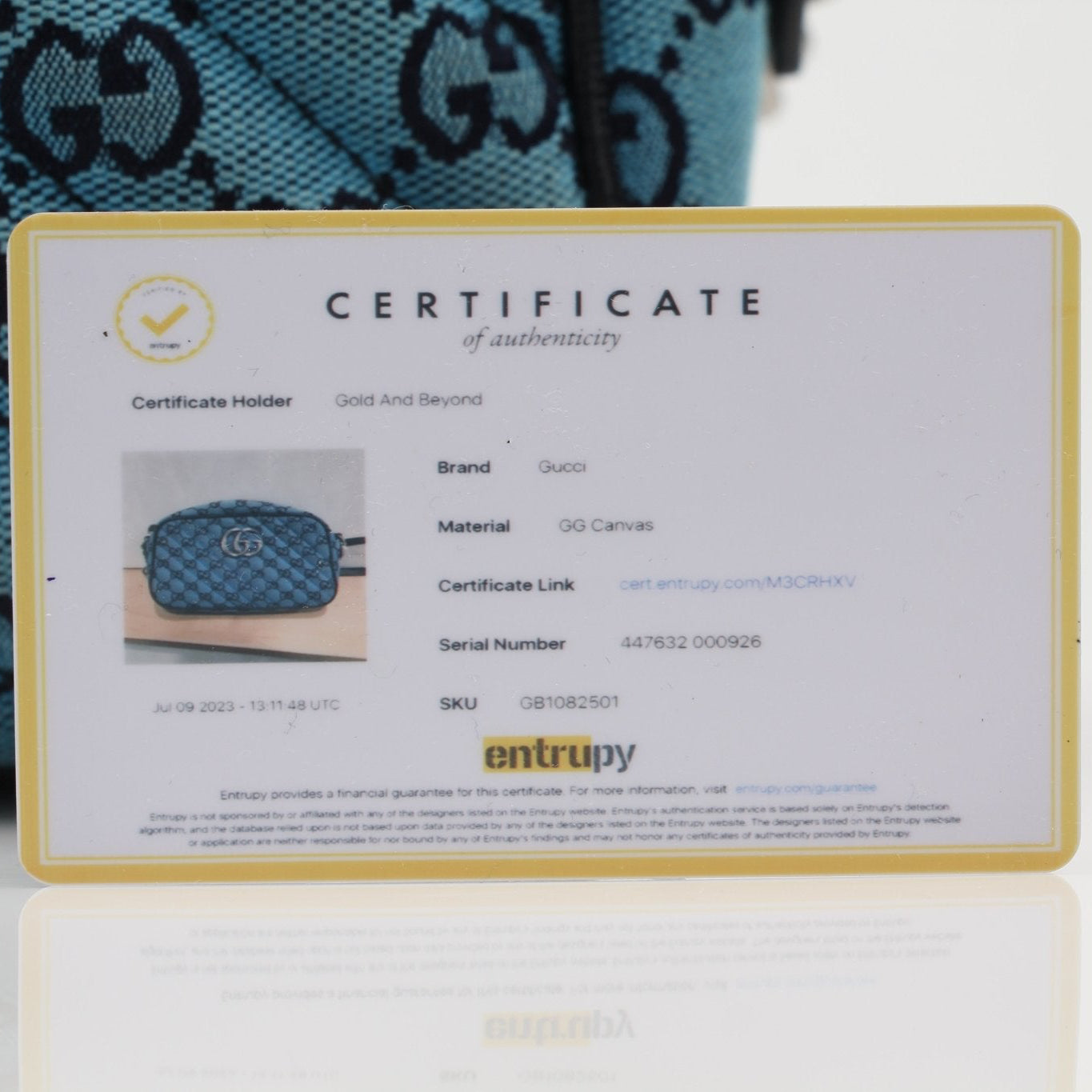Gold & Beyond Gucci GG Marmont camera bag handbag with quilted leather and chain strap, stylish accessory for everyday use.