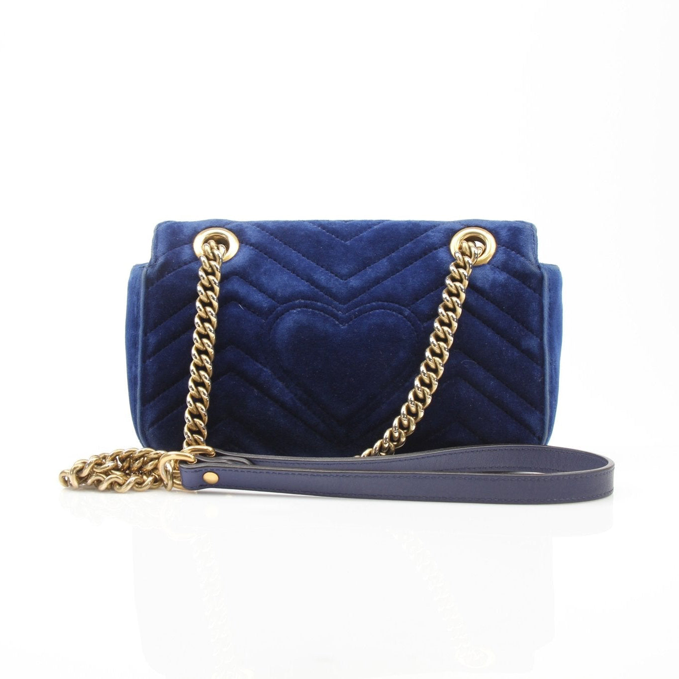 Gold & Beyond Gucci GG Marmont Mini Handbag with chevron quilted leather and gold-tone hardware on a stylish handbag.