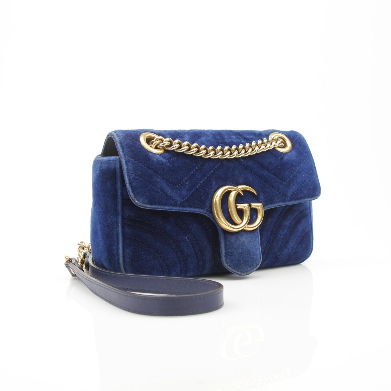 Gold & Beyond Gucci GG Marmont Mini Handbag with quilted leather and chain strap, stylish accessory for everyday use