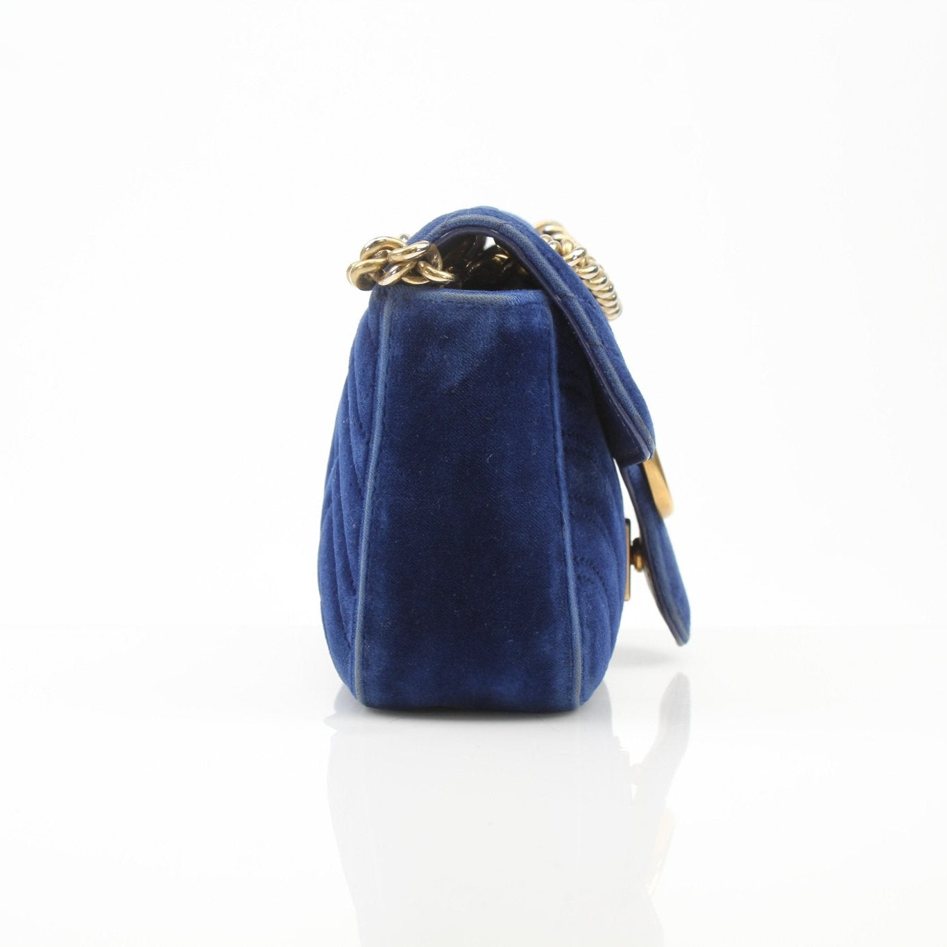 Gold & Beyond Gucci GG Marmont Mini Handbag with quilted leather and chain strap, stylish accessory for everyday or evening wear.