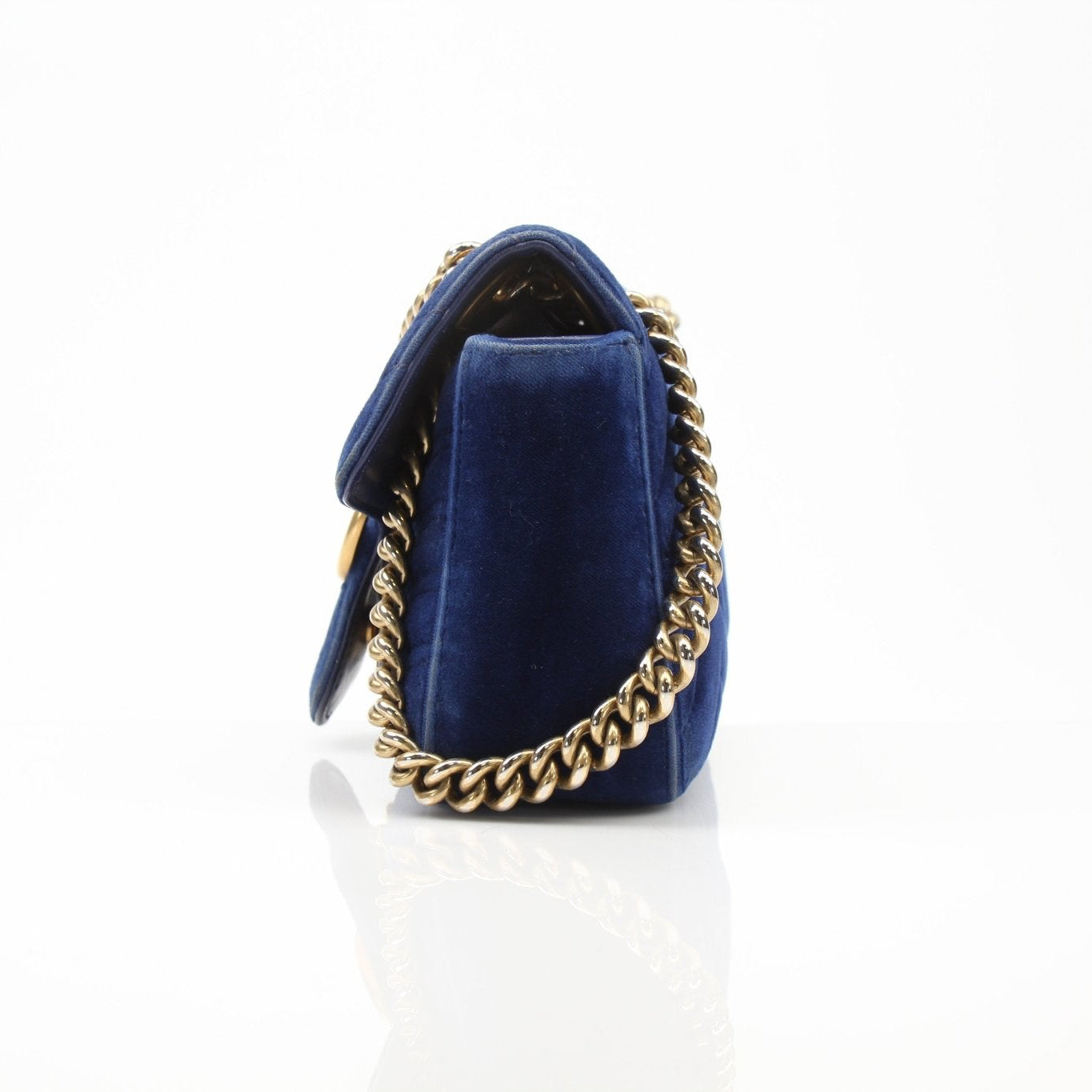 Gold & Beyond Gucci GG Marmont Mini Handbag with quilted leather and gold-tone hardware, stylish accessory for everyday use.