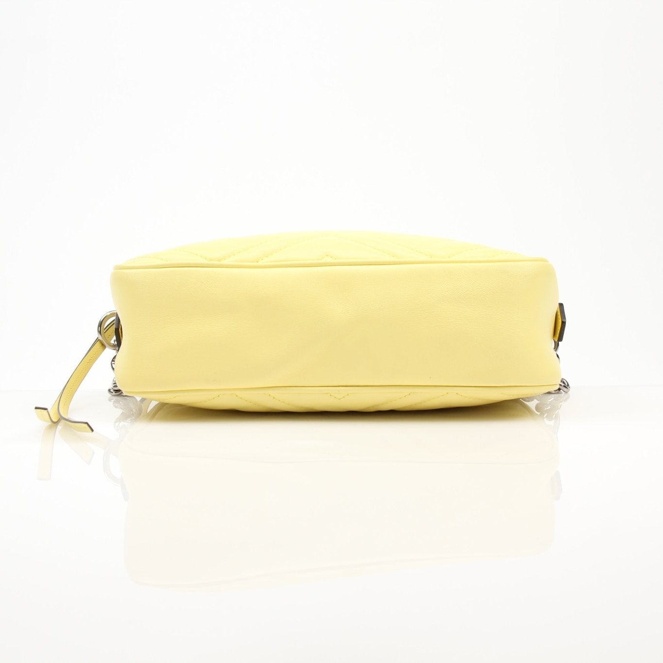 Gold & Beyond Gucci GG Marmont shoulder handbag with quilted leather and chain strap, stylish and luxurious accessory.