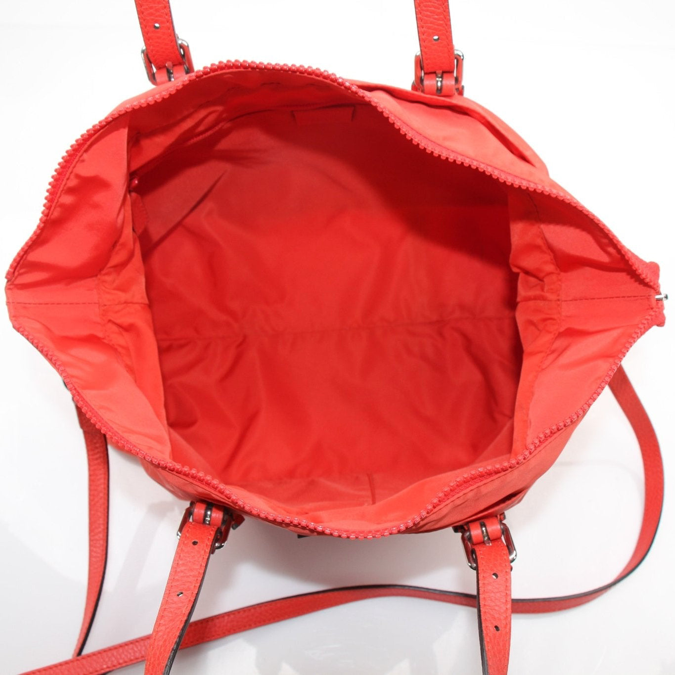 Gold & Beyond Gucci GG nylon tote bag, stylish travel bag with logo print and durable handles, ideal for everyday use.