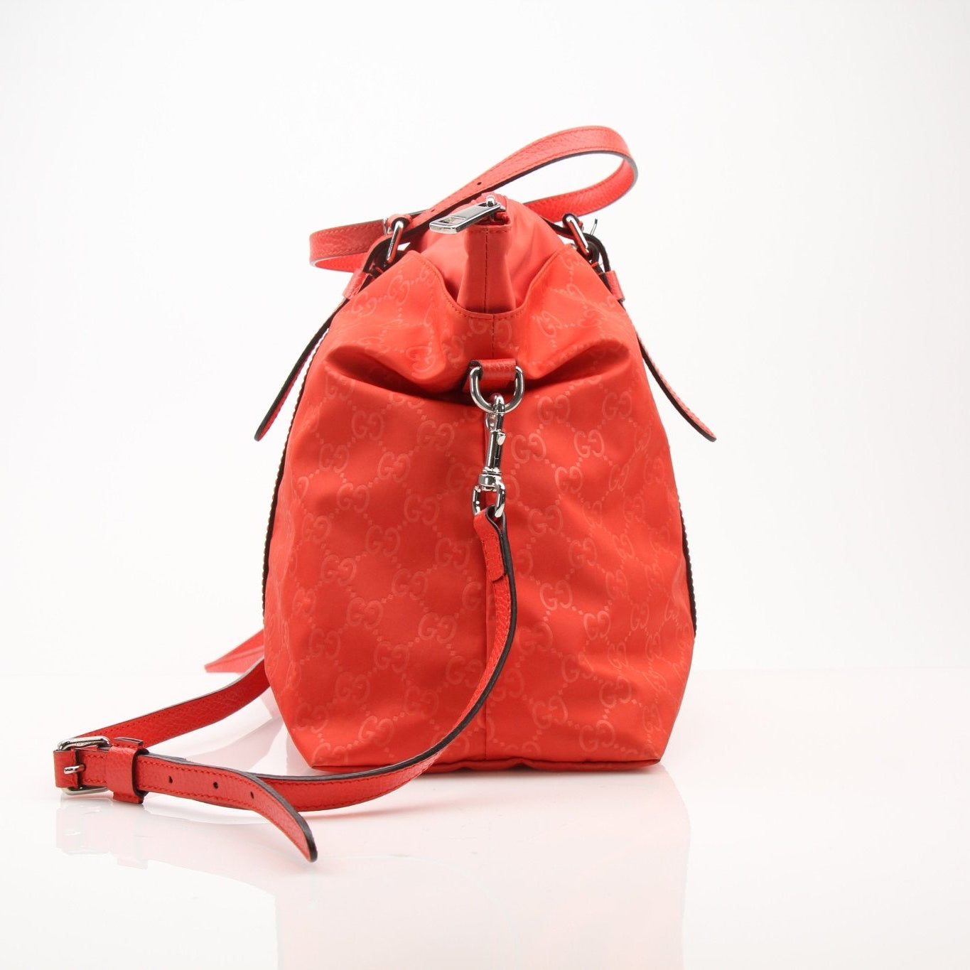 Gucci GG nylon tote bag for travel, featuring the iconic logo and spacious design, shown in a stylish view.
