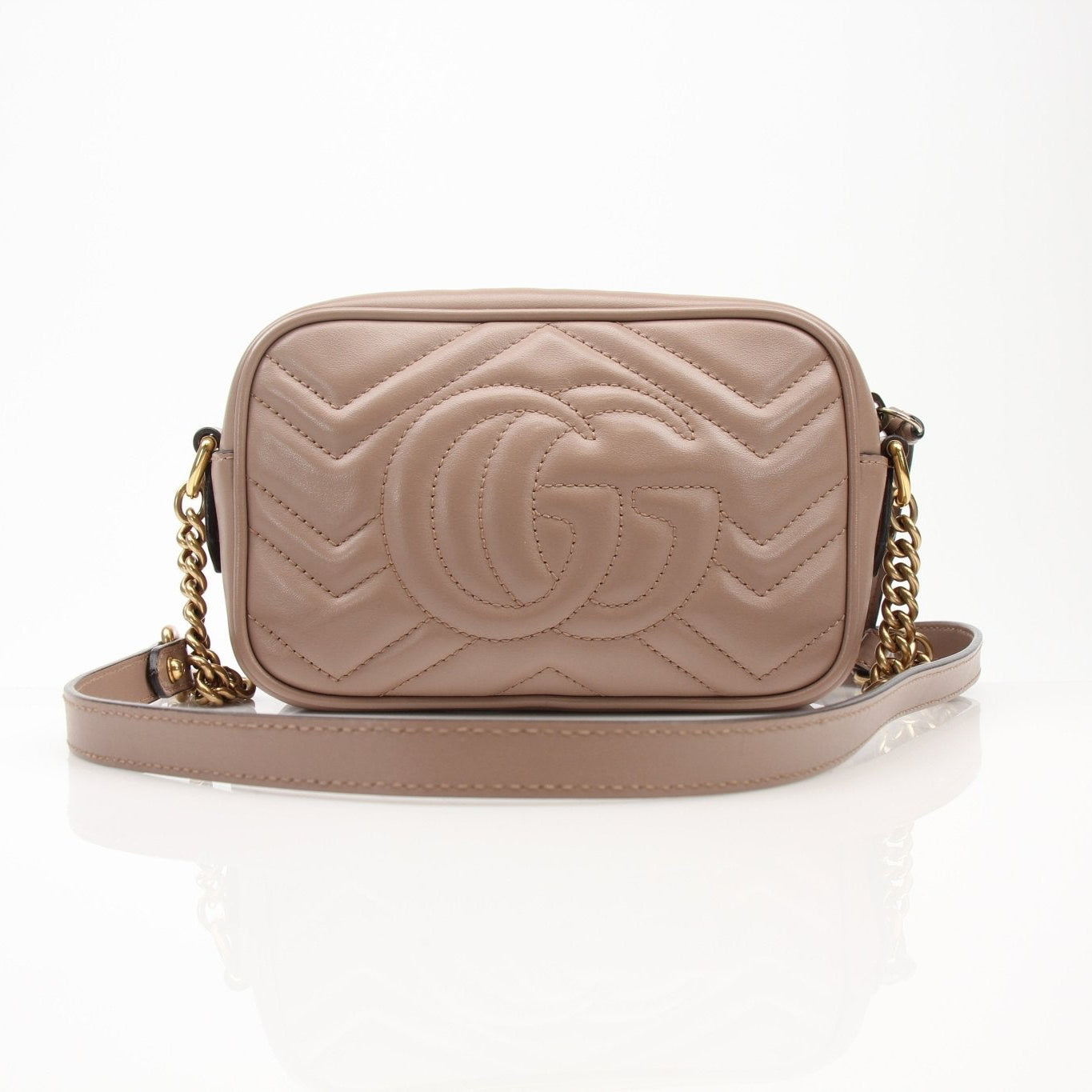 Gucci Mini GG Marmont Mini Camera Bag handbag with quilted leather and gold chain strap, stylish accessory by Gold & Beyond.