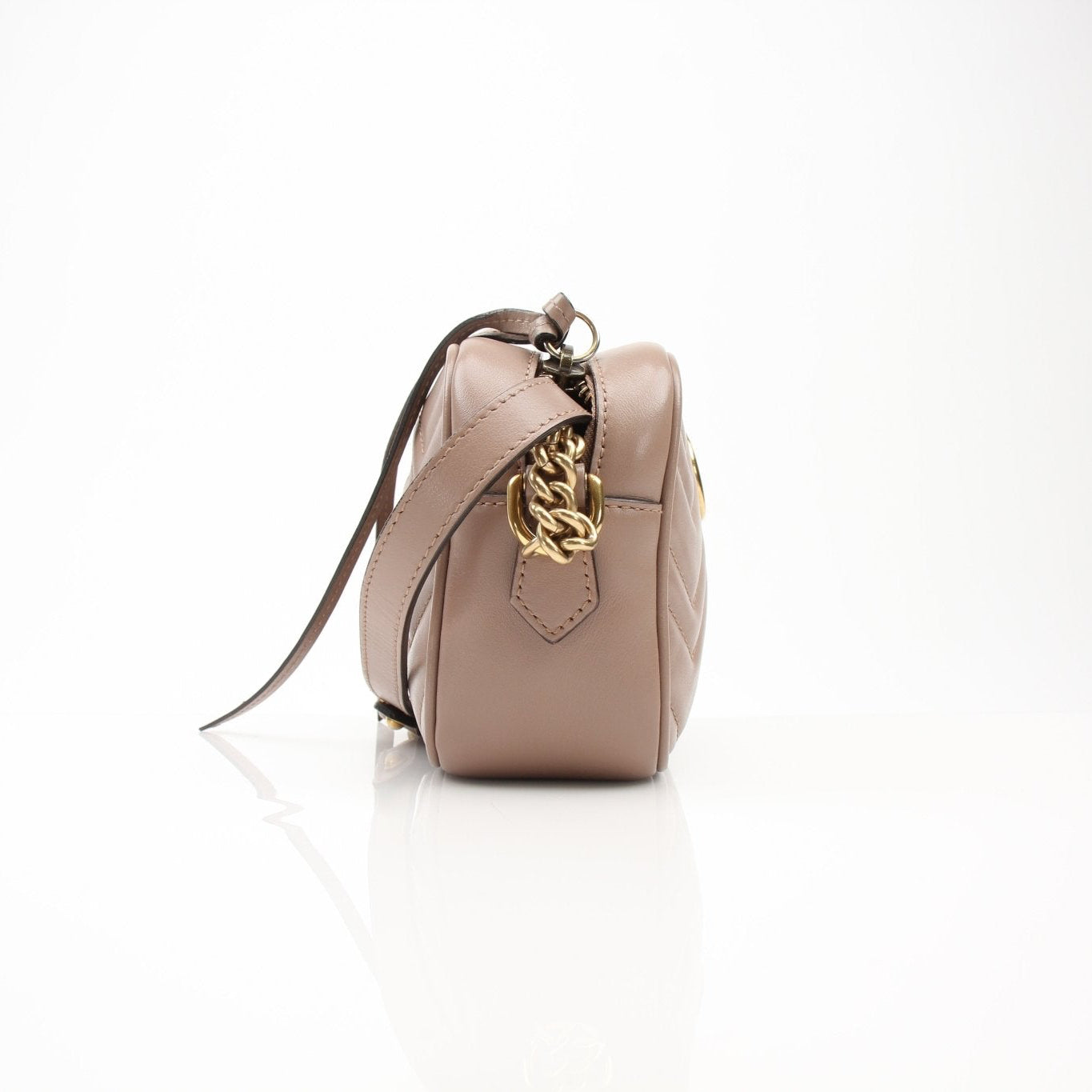 Gucci Mini GG Marmont Mini Camera Bag handbag with quilted leather and gold chain strap, featuring the iconic GG logo.