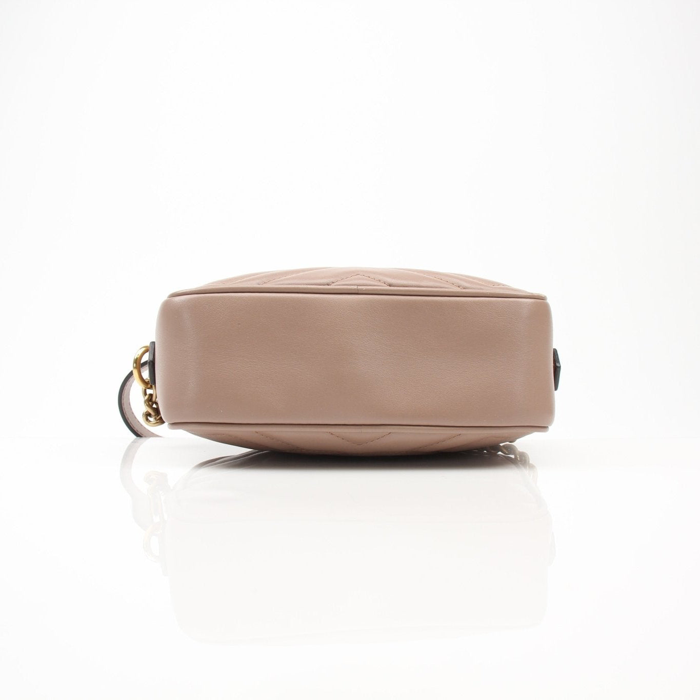 Gucci Mini GG Marmont Mini Camera Bag handbag with quilted leather and gold chain strap, stylish and compact accessory.