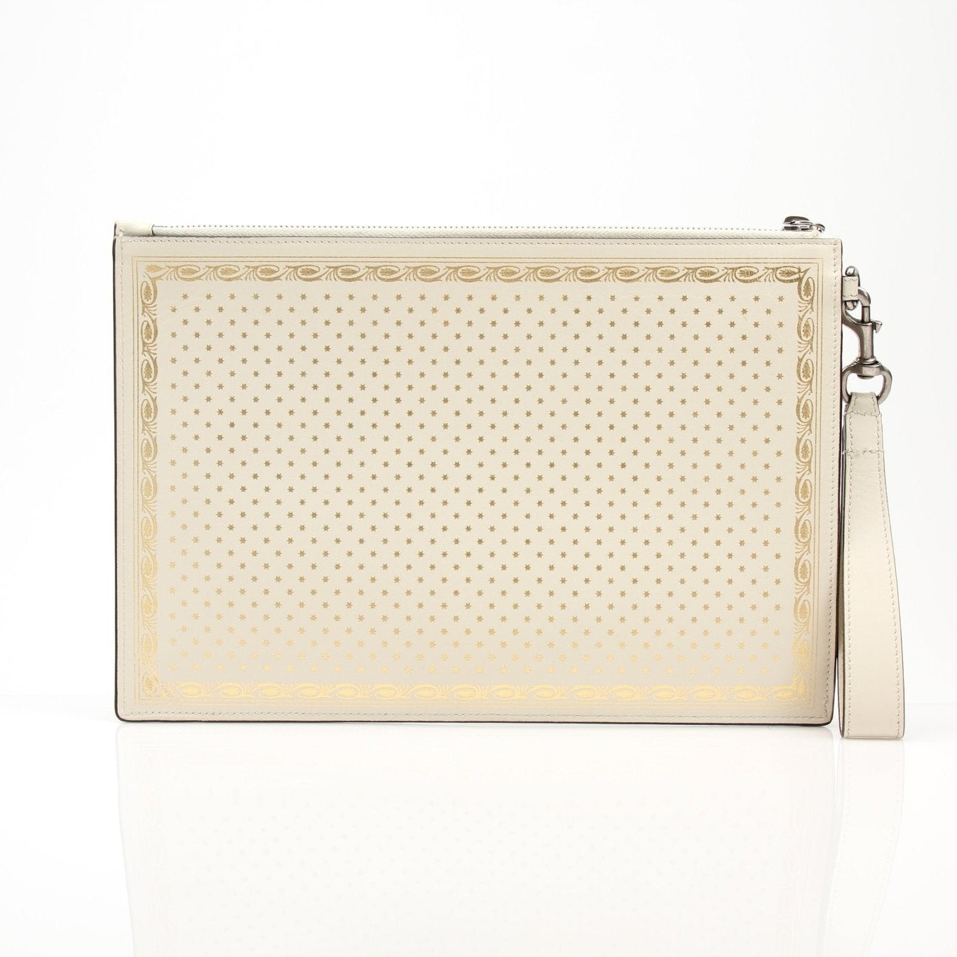 Cream leather Gucci Moon and Stars zip-around pouch with celestial print, featuring gold accents and a compact handbag design.