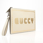 Cream leather Gucci Moon and Stars zip-around pouch with celestial print, featuring gold accents and compact handbag design.