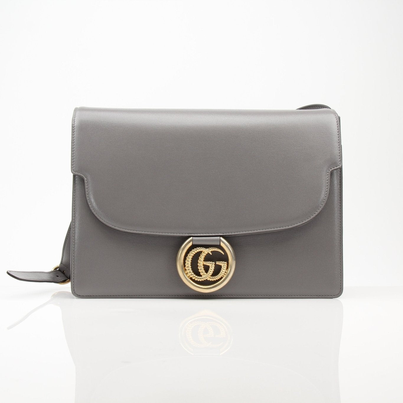 Gold & Beyond Gucci GG Marmont shoulder handbag with quilted leather and chain strap, stylish and versatile accessory.