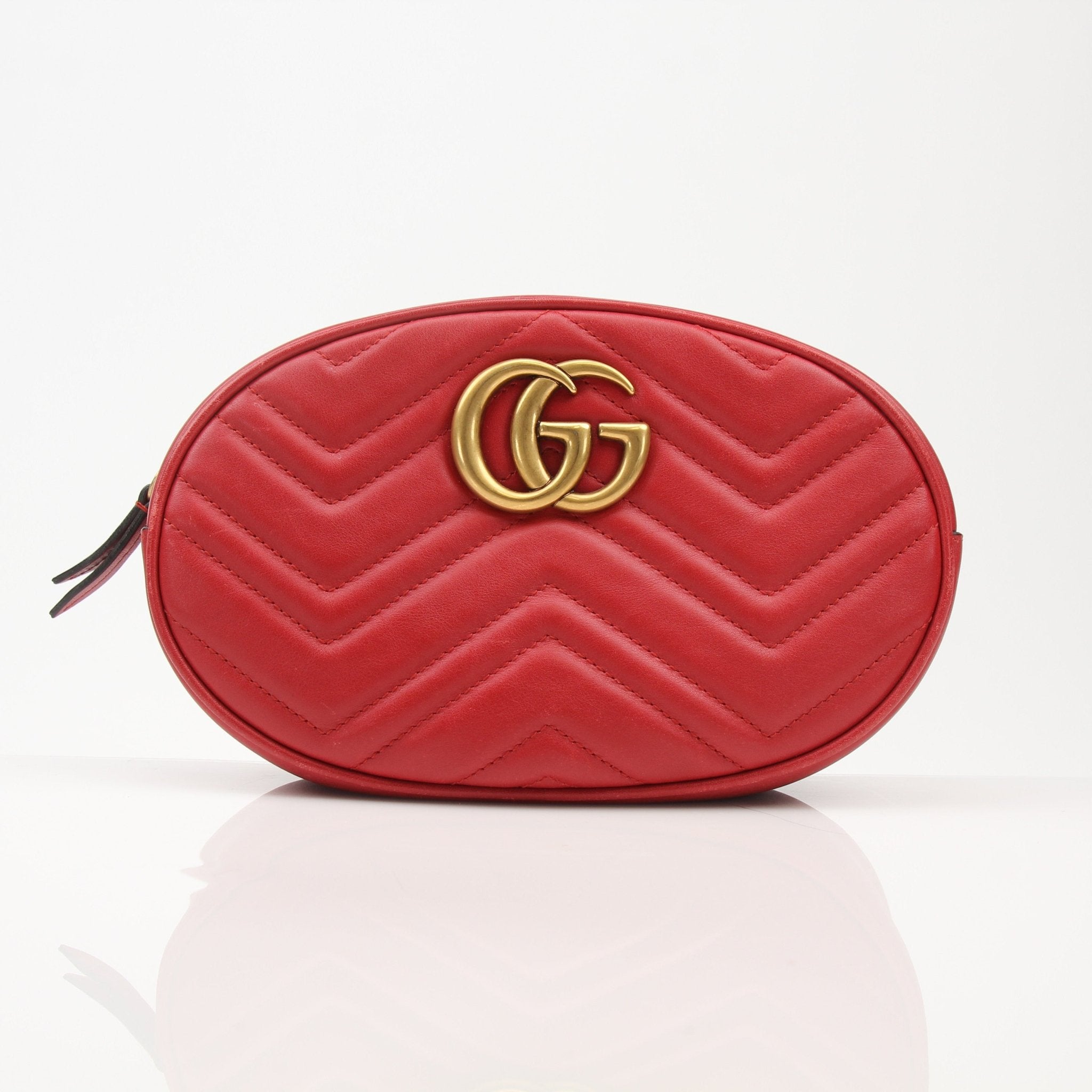 Gold & Beyond Gucci GG Marmont belt bag handbag with quilted leather and gold hardware, stylish and compact accessory.