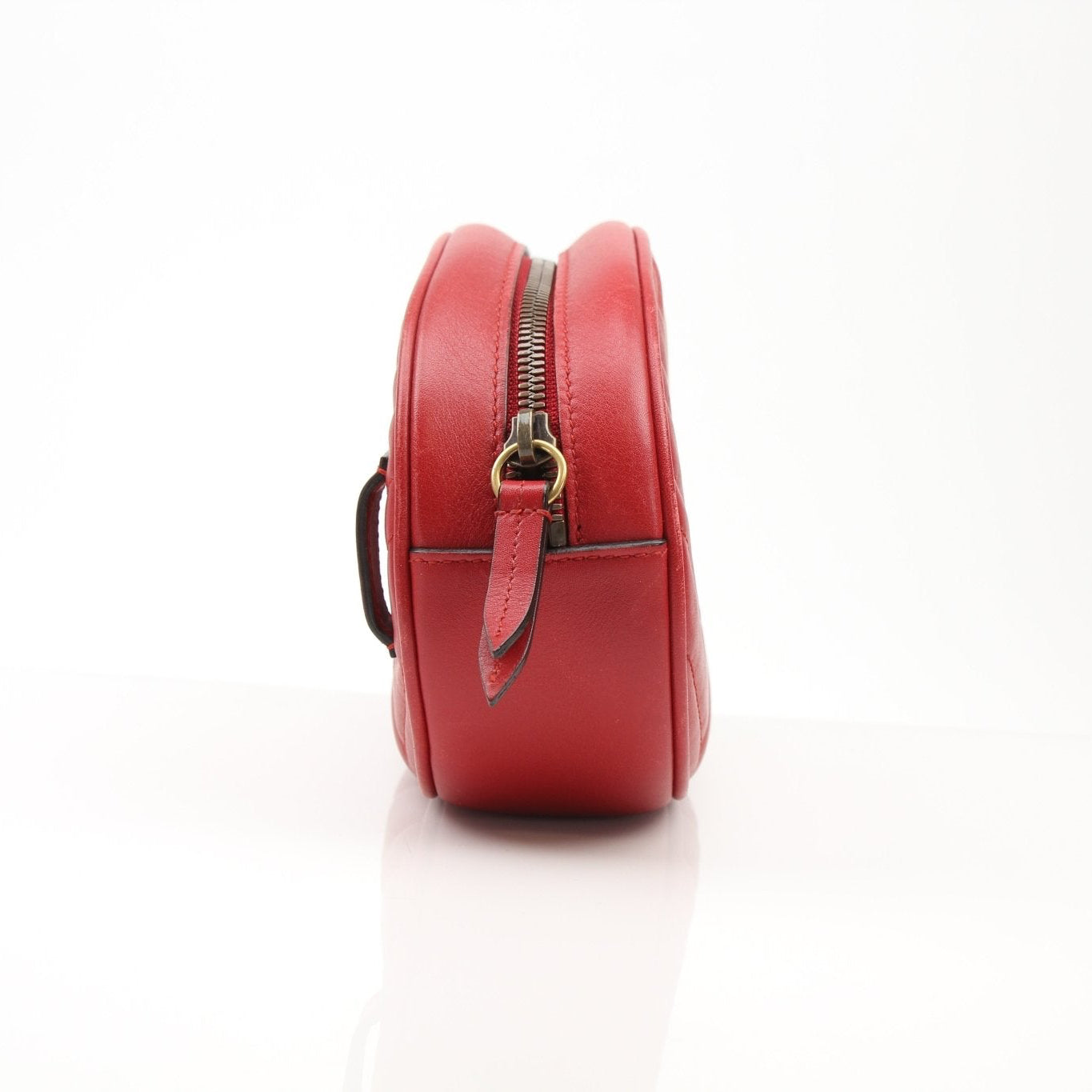 Gold & Beyond Gucci GG Marmont Belt Bag handbag with quilted leather and chain strap, featuring the signature GG logo.
