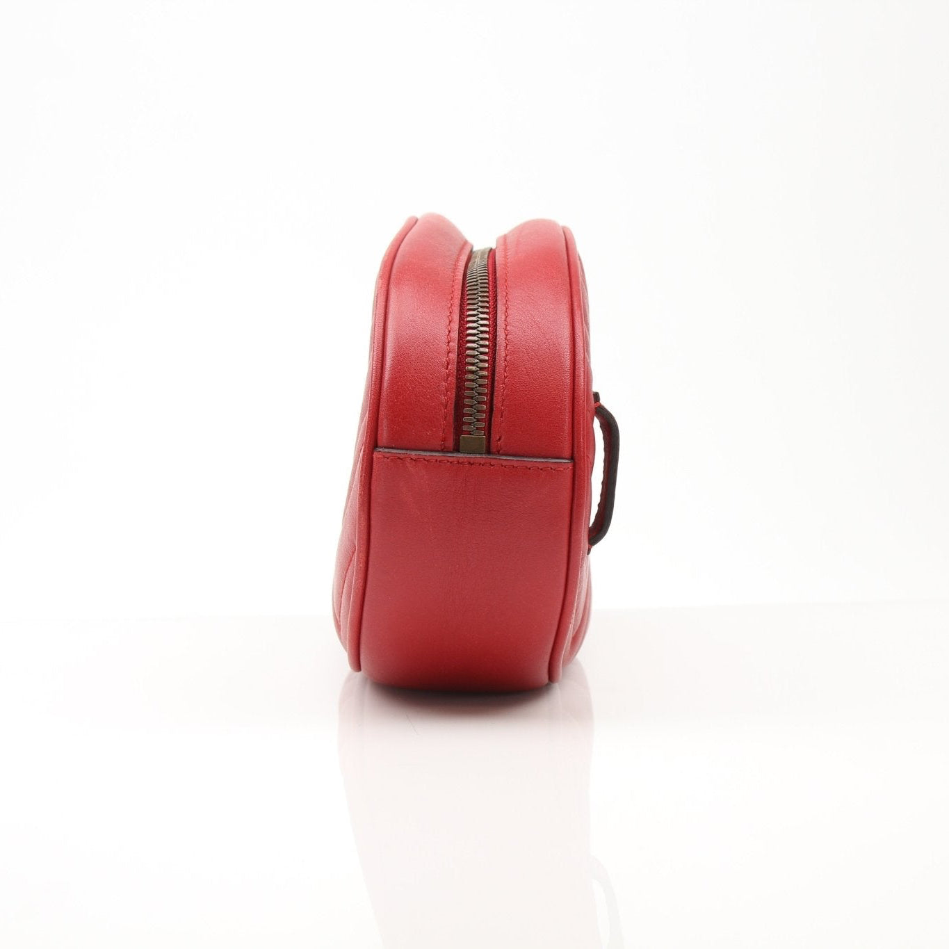 Gold & Beyond Gucci GG Marmont belt bag handbag with quilted leather and gold hardware, featuring a chain strap.