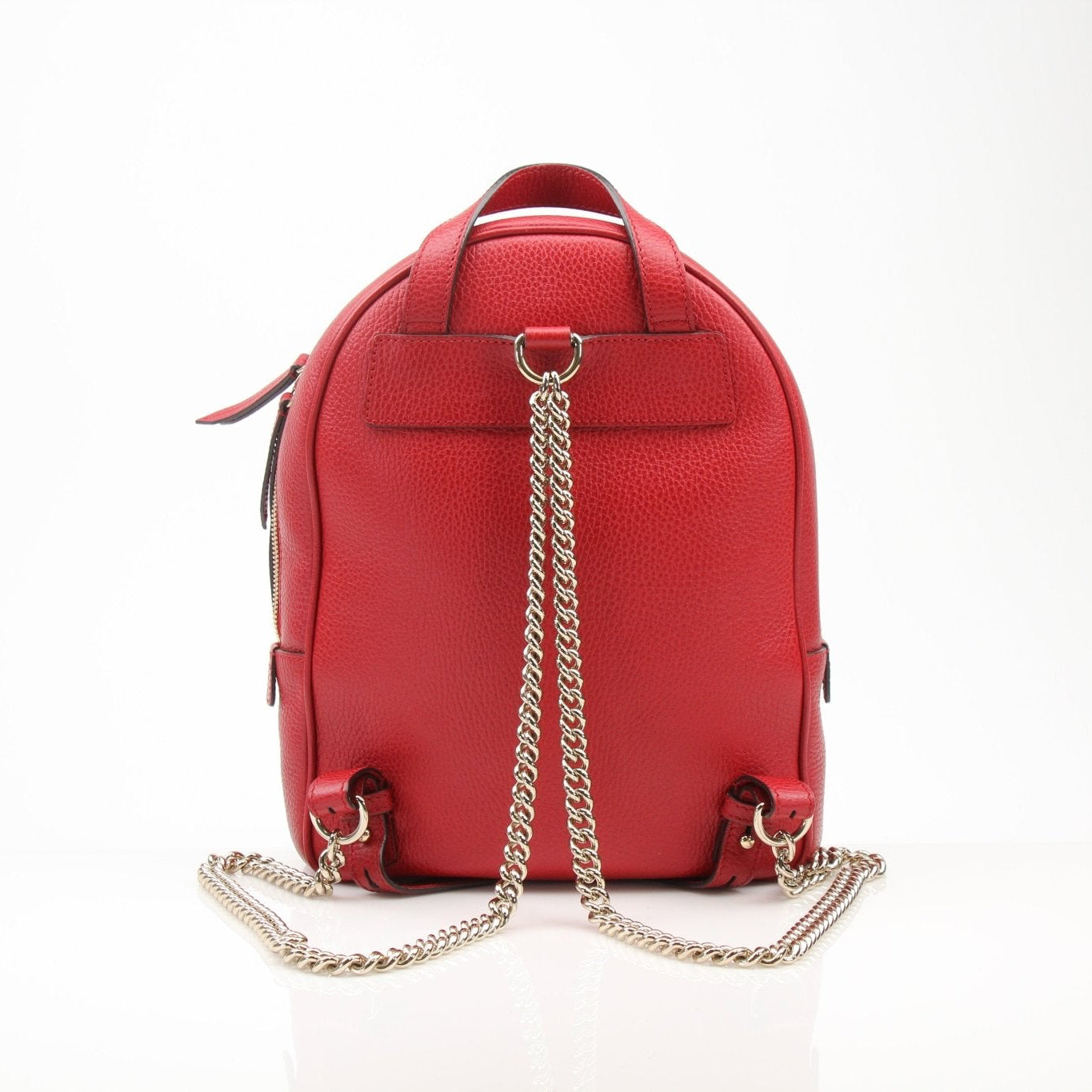 Gold & Beyond Gucci Soho Chain Backpack for travel, featuring the iconic design, chain straps, and spacious interior.