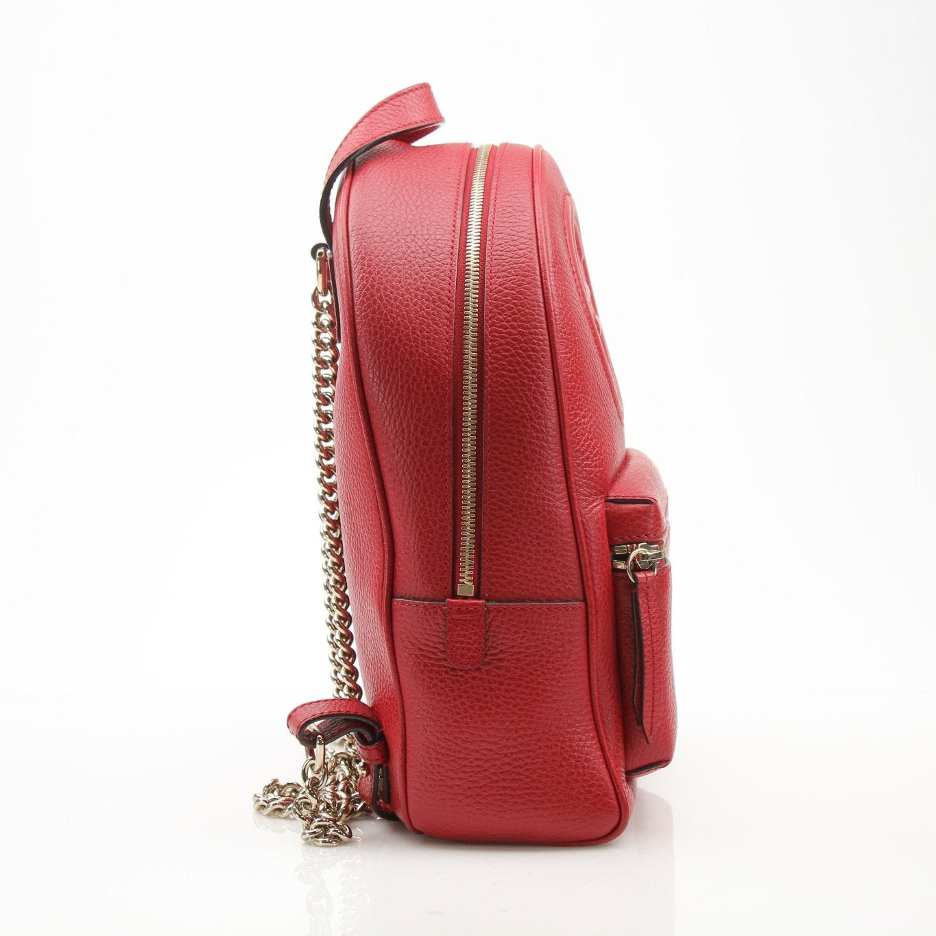Gucci Soho Chain Backpack in black leather with gold hardware, featuring a chain shoulder strap and front logo patch.