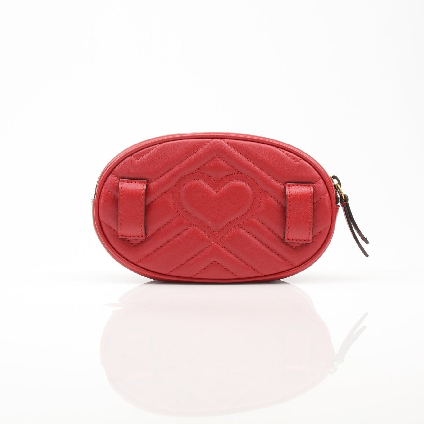 Gucci Marmont Matelassé GG Belt Bag handbag with gold hardware and quilted design, featuring the iconic GG logo.