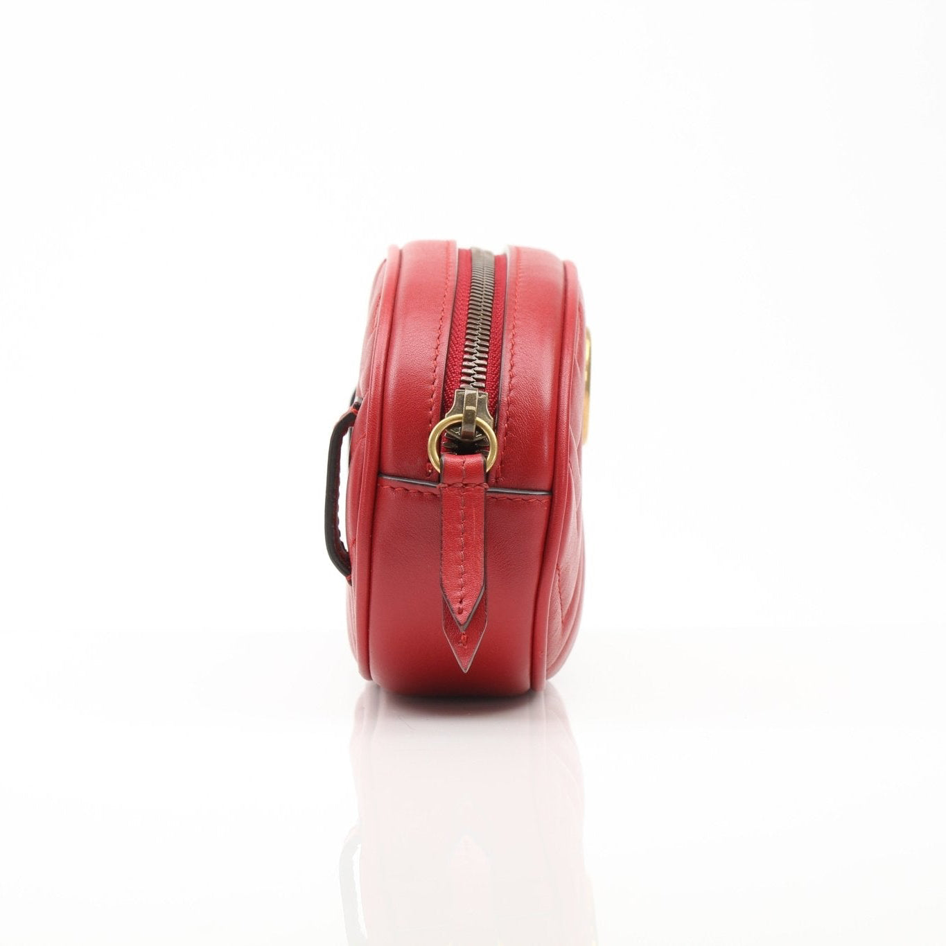 Gold & Beyond Gucci Marmont Matelassé GG belt bag, stylish handbag with quilted design and gold hardware.