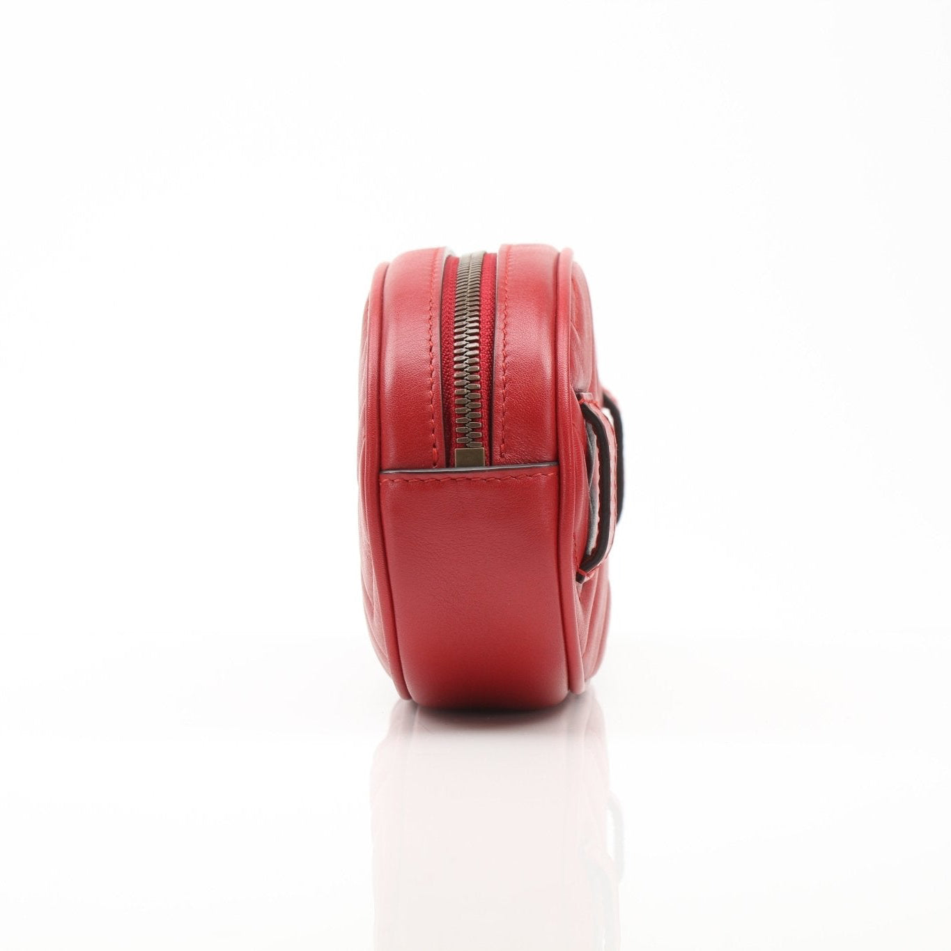 Gucci Marmont Matelassé GG Belt Bag handbag with quilted leather and gold hardware, stylish accessory for everyday wear