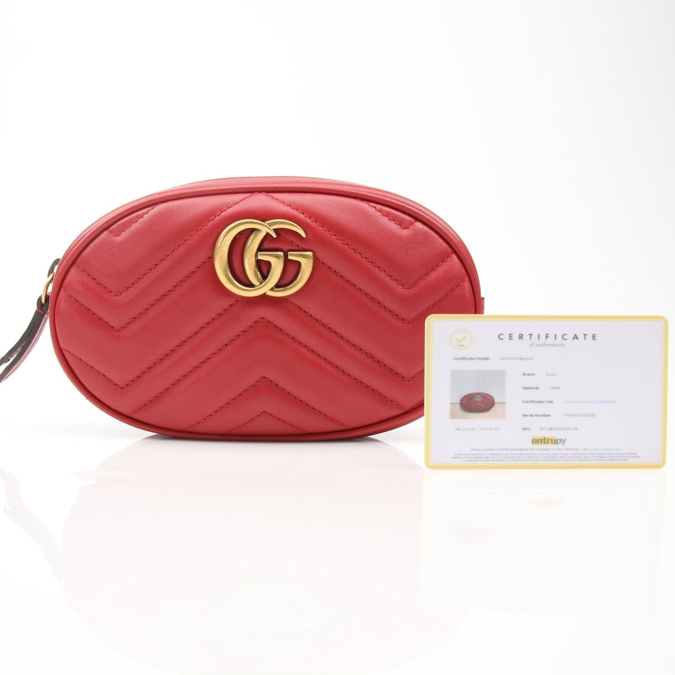 Gold & Beyond Gucci Marmont Matelassé GG belt bag with gold hardware and quilted leather design, stylish handbag on a neutral background.