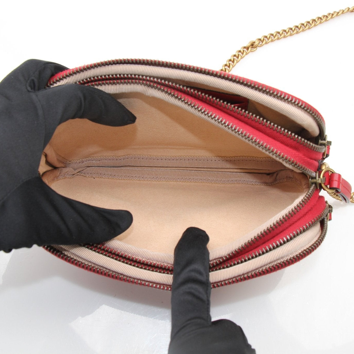 Gold & Beyond Gucci GG Marmont Matelassé Mini Shoulder Bag, beige leather handbag with chevron quilted design and gold hardware.