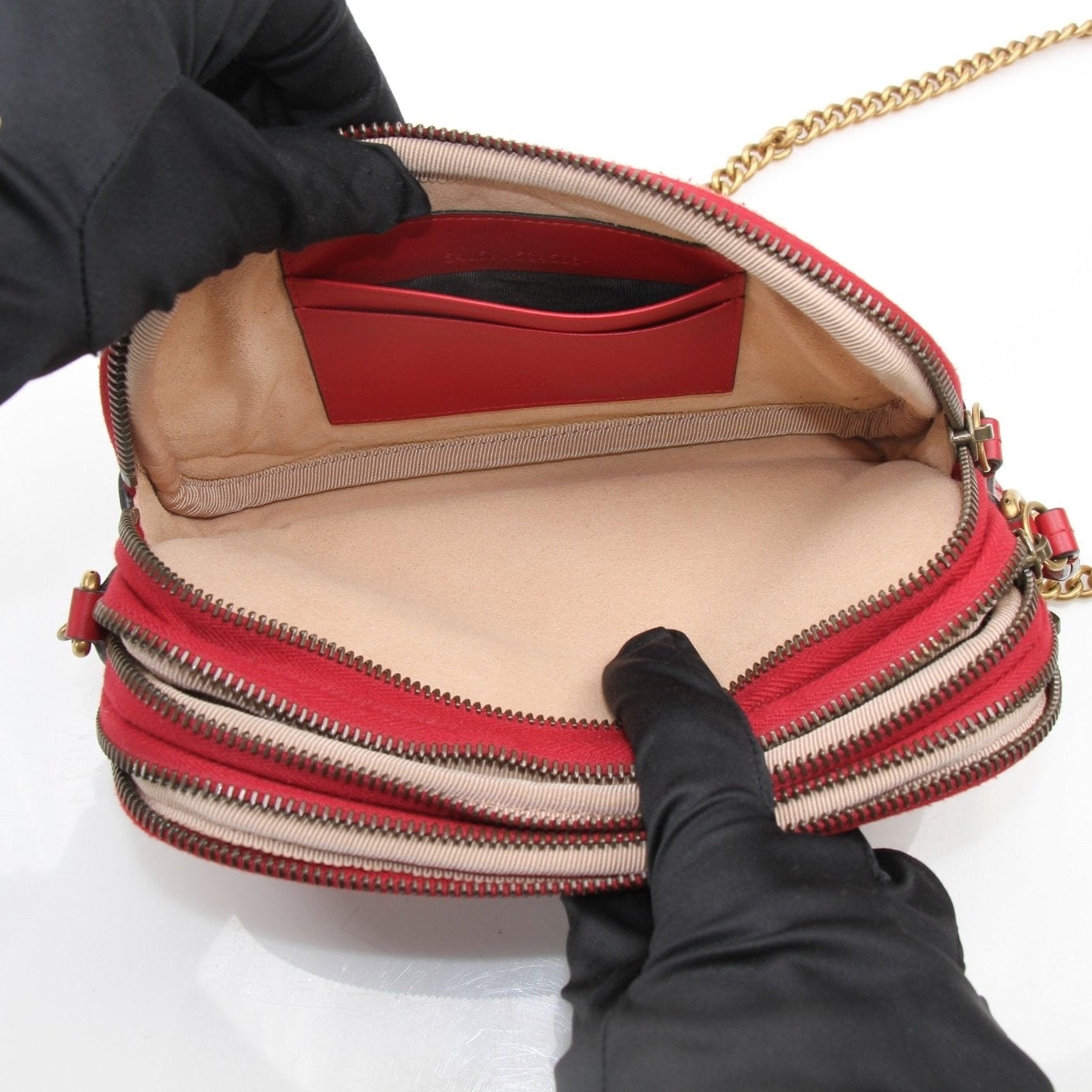Gucci GG Marmont Matelassé Mini Shoulder Bag featuring quilted leather and gold-tone hardware.