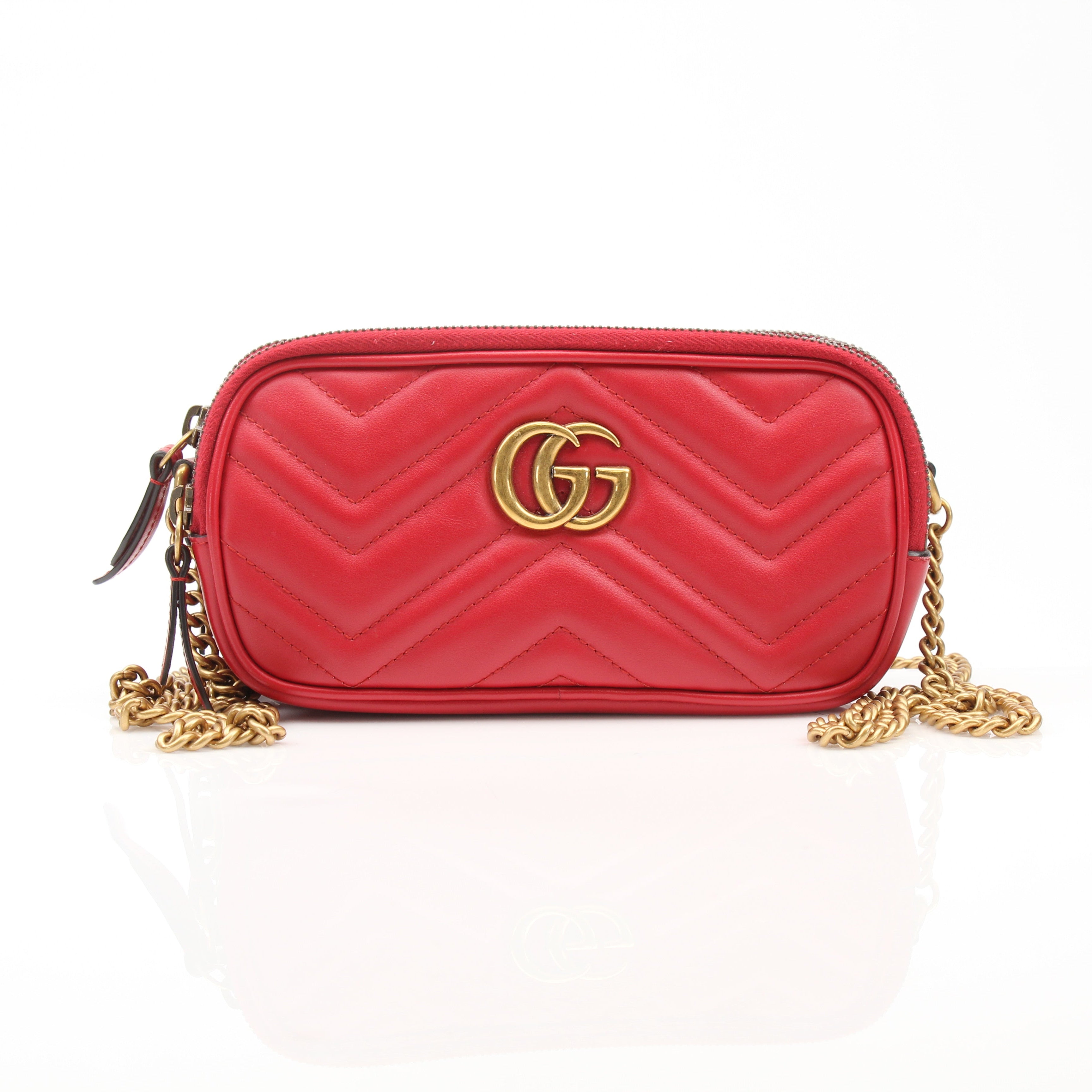 Gucci GG Marmont Matelassé Mini Shoulder Bag with chain strap, black leather, and signature quilting design.